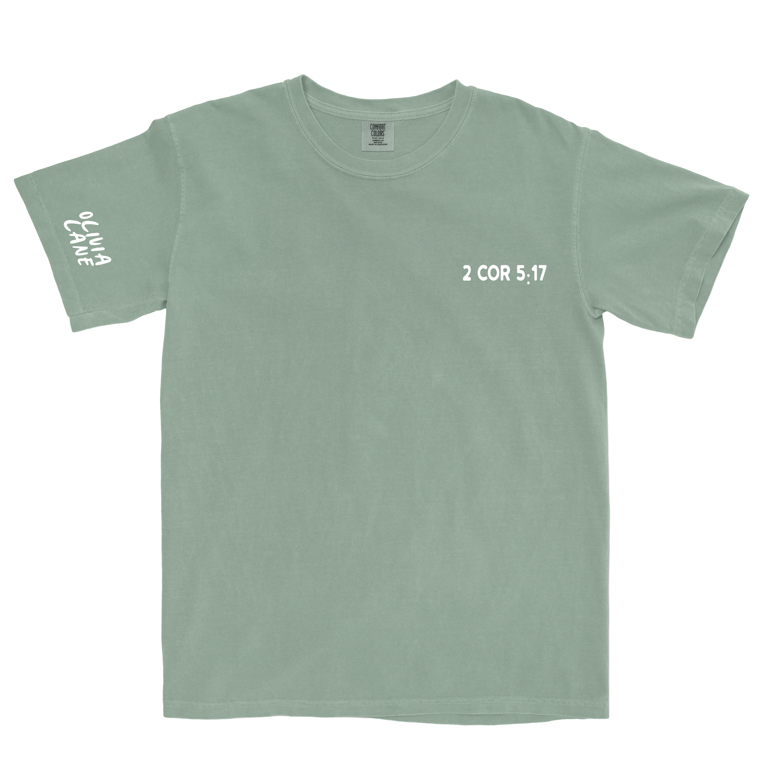 Light green T-shirt with white text reading '2 COR 5:17' and other text on the sleeve.