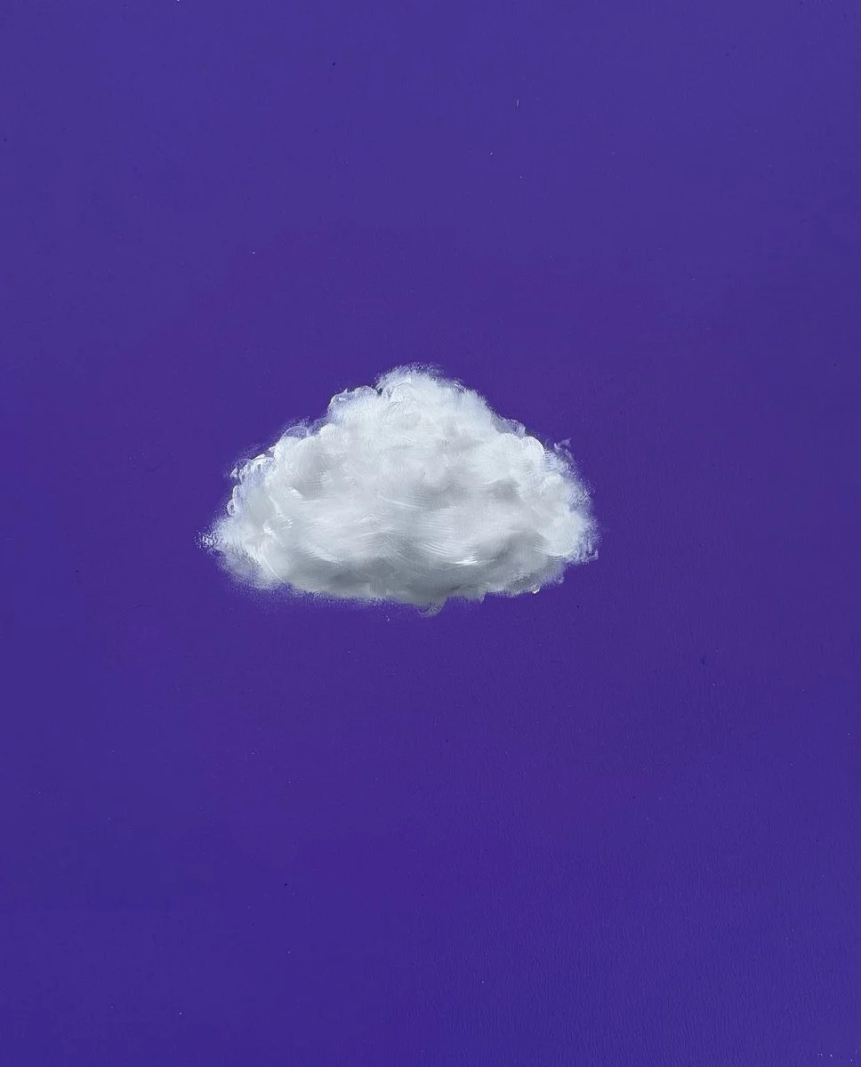 A small, fluffy white cloud against a solid purple background.