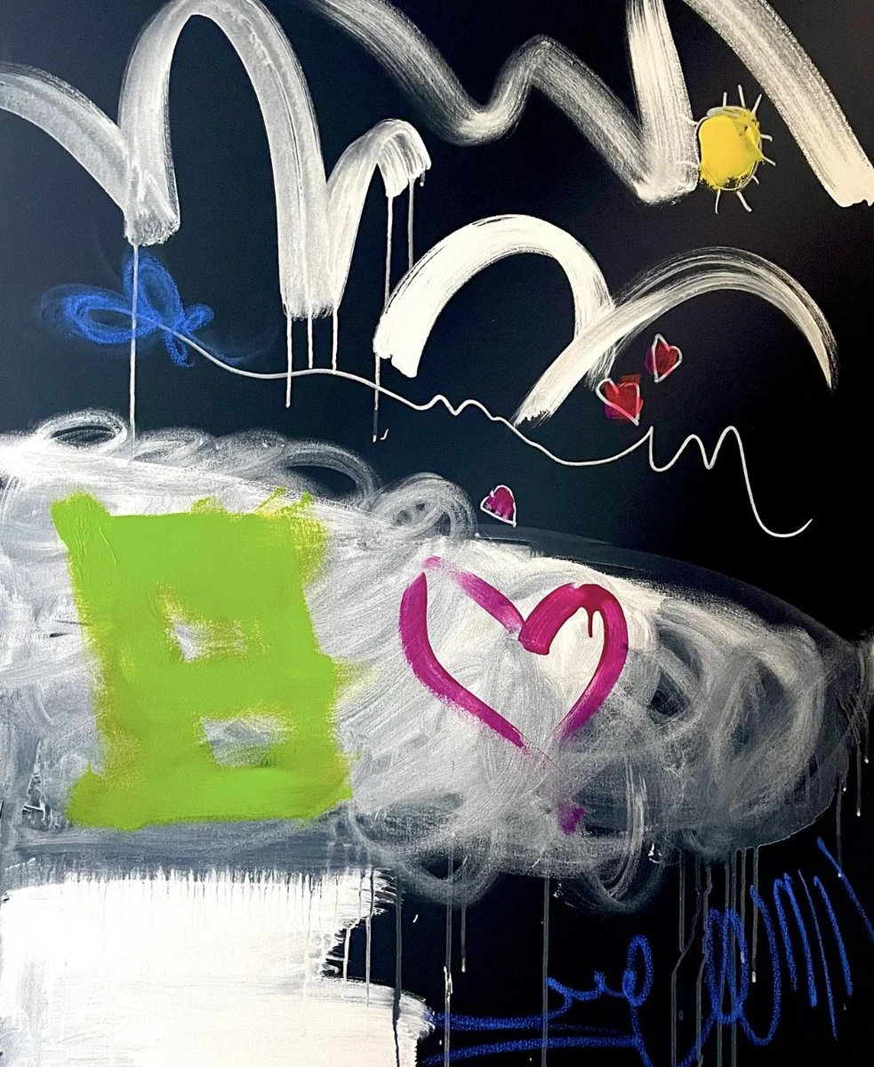 Colorful abstract drawing on a dark background with white, green, pink, blue, and yellow paint, including hearts, a butterfly, and swirling lines.