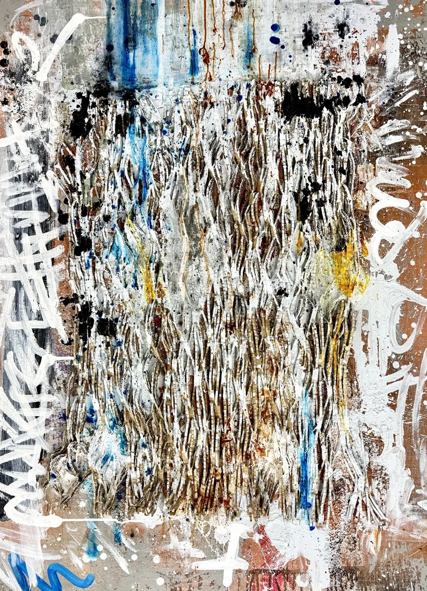 Abstract expressionist painting featuring layered textures with drip and splatter effects in black, white, brown, blue, yellow, and red. Graffiti-style markings and illegible writings border the composition.