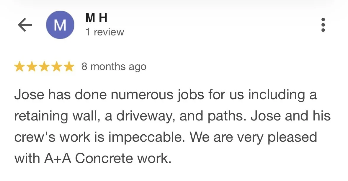 Screenshot of an online review for a construction service, praising work on a retaining wall, driveway, and paths.