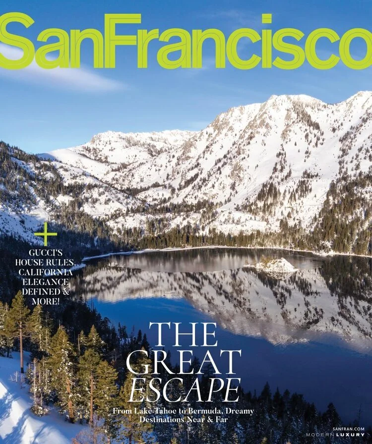 Cover of San Francisco magazine featuring a snow-capped mountain landscape reflected in a lake with trees in the foreground, and the headline 'The Great Escape' with a subtitle about lakes, Tahoe, Bermuda, and nearby destinations.