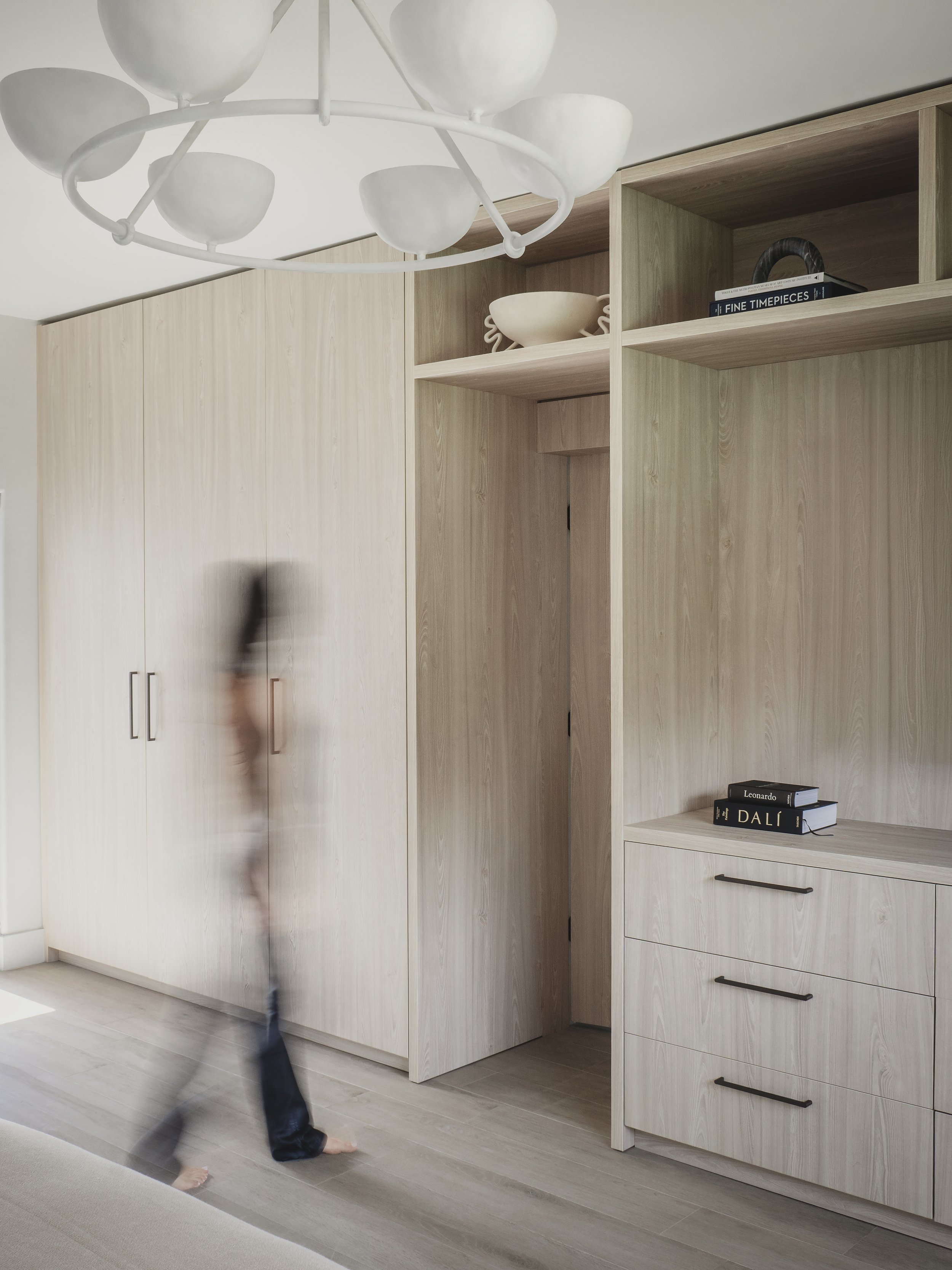 Custom bedroom millwork storage cabinets designed by Baam Studio
