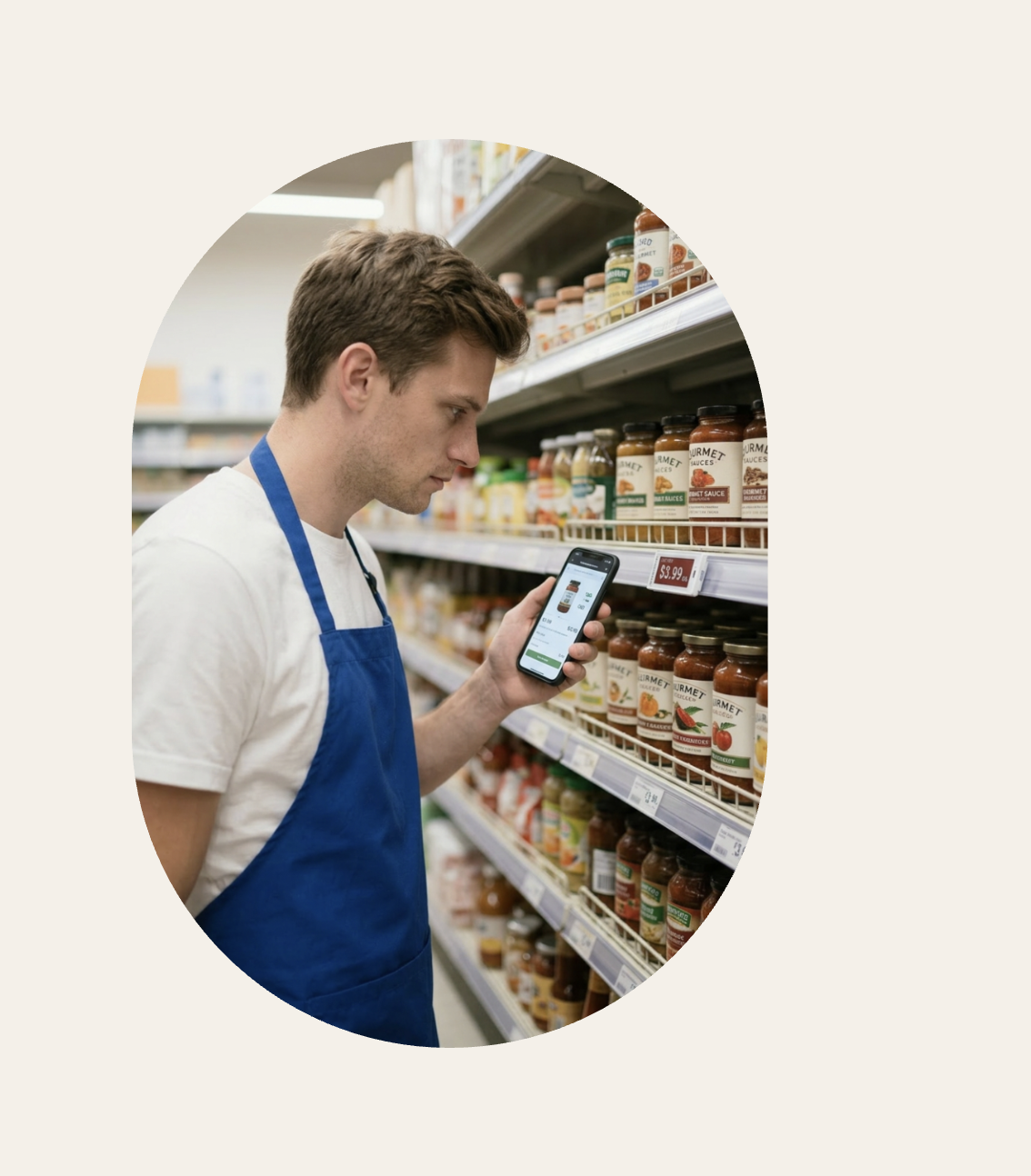 Grocery employee comparing digital shelf tag app interface to tag interface.