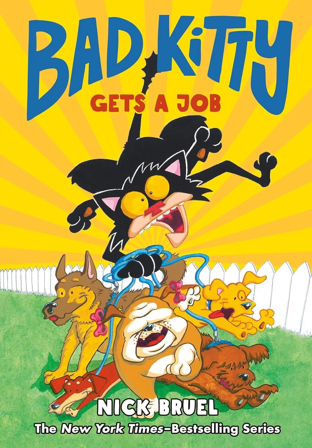 Cover illustration of the book "Bad Kitty Gets a Job" showing a cartoon black cat with yellow eyes jumping in the air, surrounded by several small dogs, all with exaggerated expressions. The background is yellow with radiating lines, and a white pick