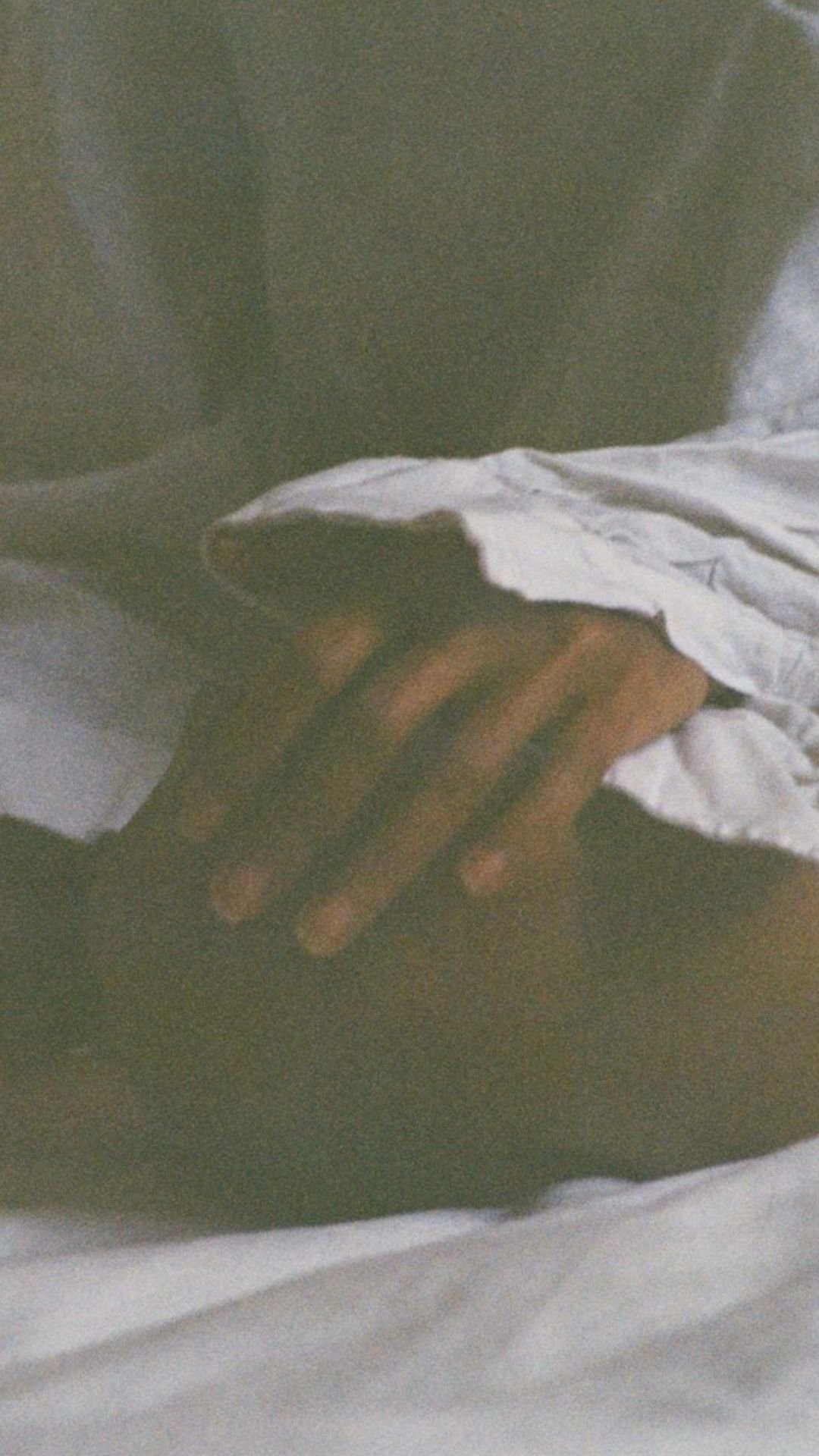 Hands resting gently during a guided meditation and wellness gathering in Grapevine, Texas.