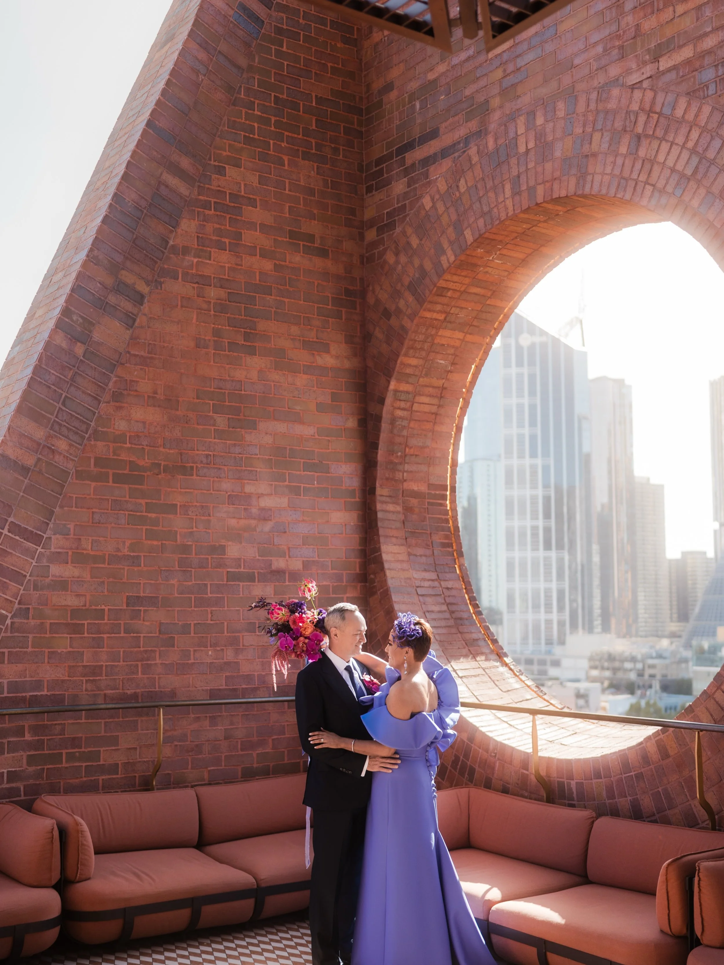 A celebration layered in colour, texture, emotion, and unapologetic joy.
From the sculptural florals to the editorial moments tucked into every corner of Hyde Melbourne Place, this day felt like stepping into a living artwork, remarkably brought to l