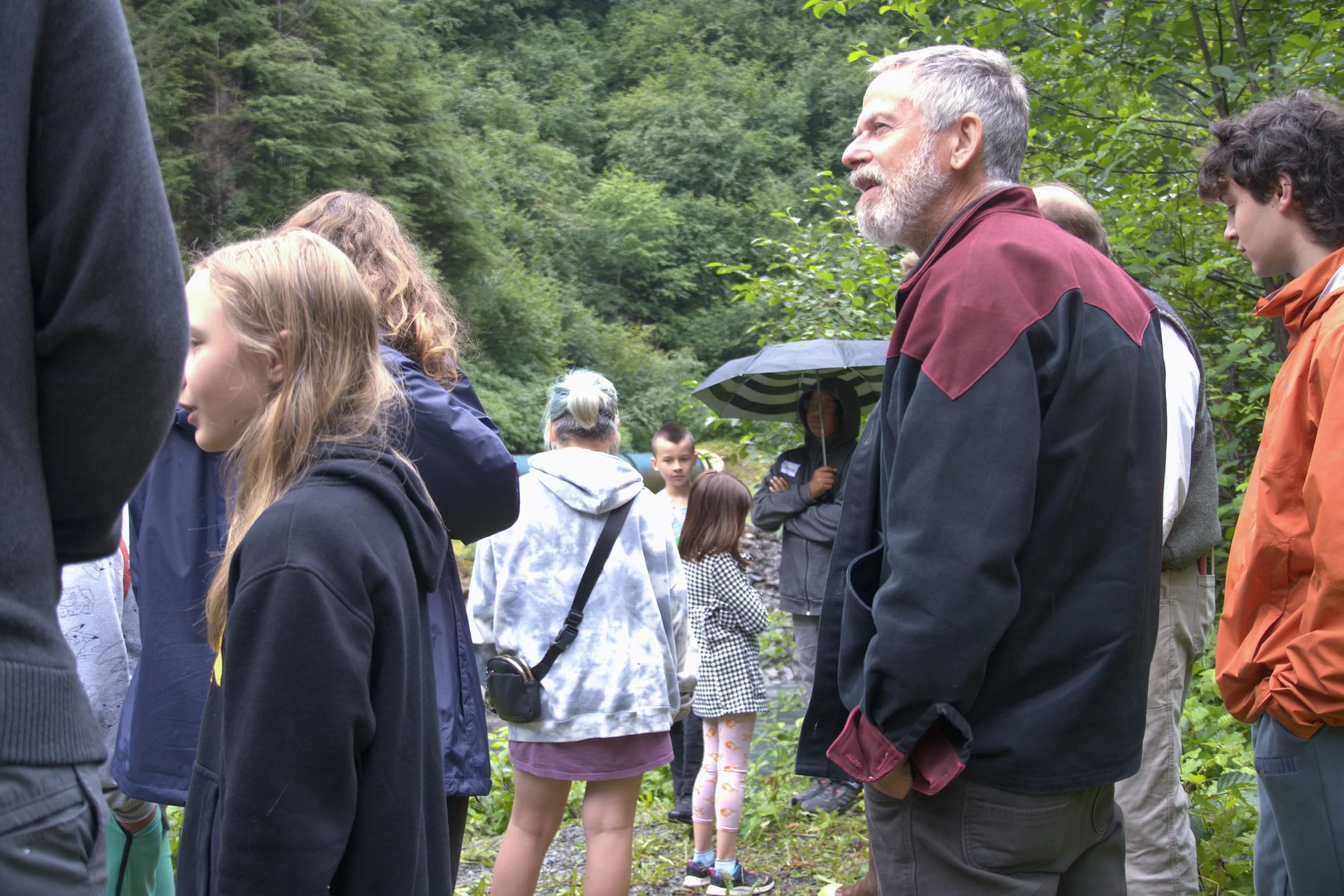 A photo of a Sitka Recreation Foundation volunteer with youth.