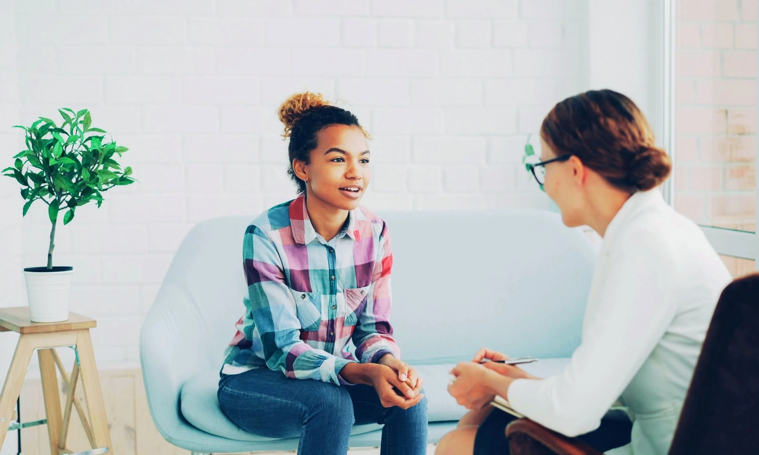 Teenager talking with a career coach