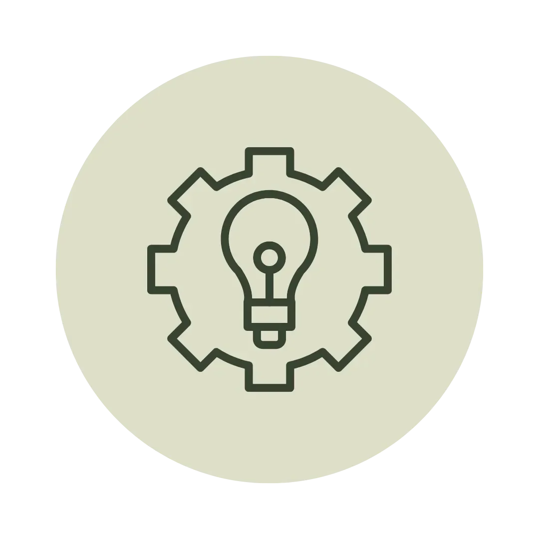 Icon of a light bulb inside a gear on a light green circular background, symbolizing innovation and technical solutions.