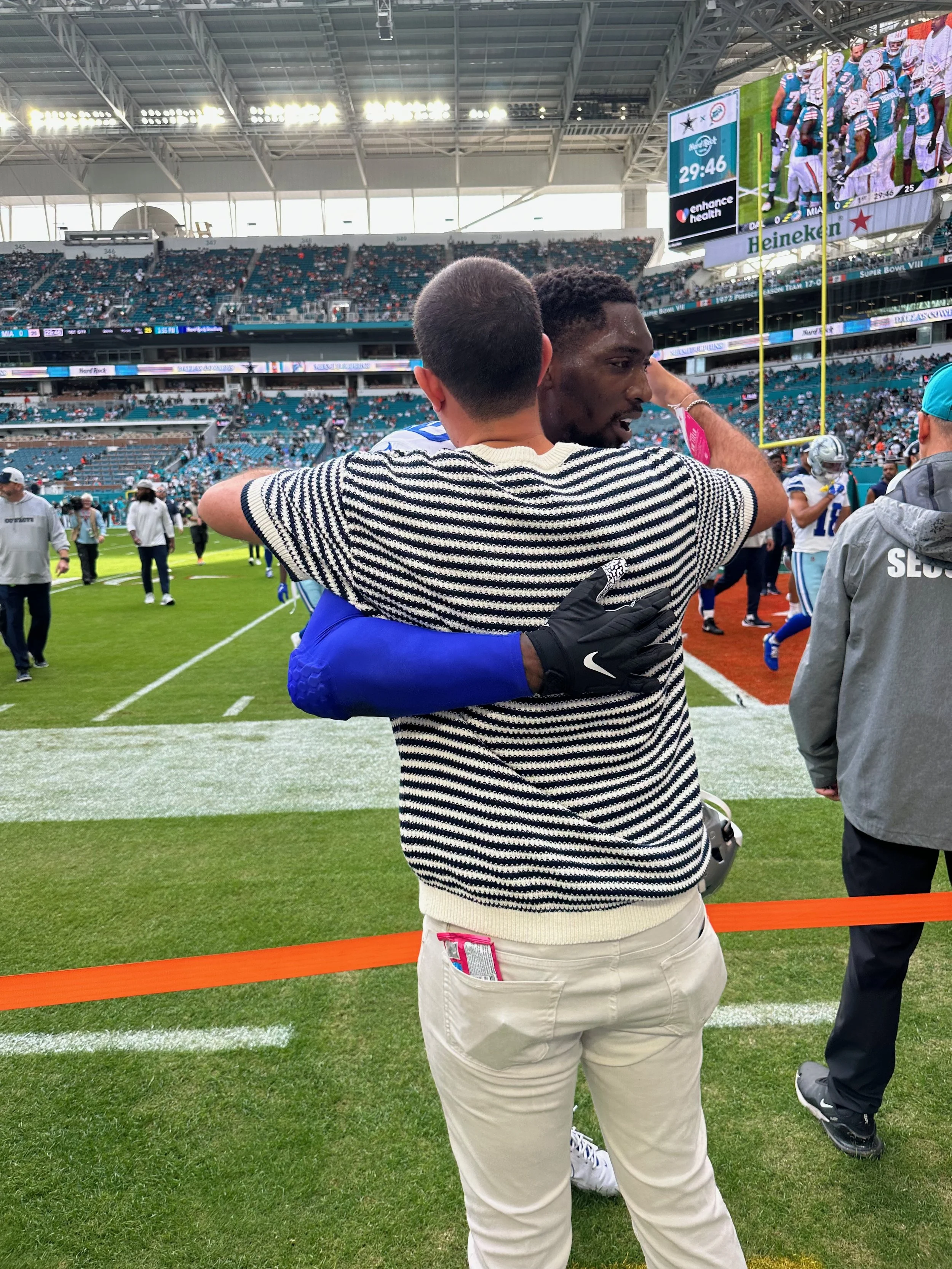 Joe Mugrabi with Demarcus Lawrence