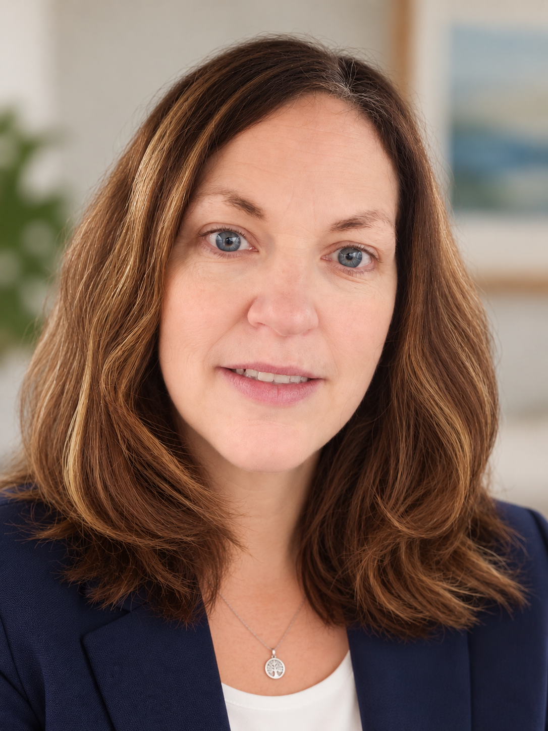 woman psychotherapist smiles at camera