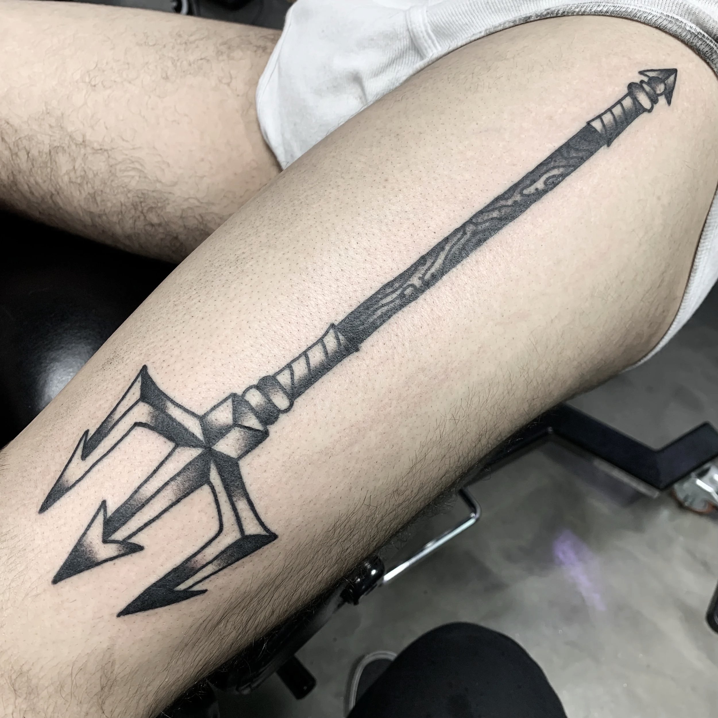 Bold Traditional Tattoo of an ornate triadent