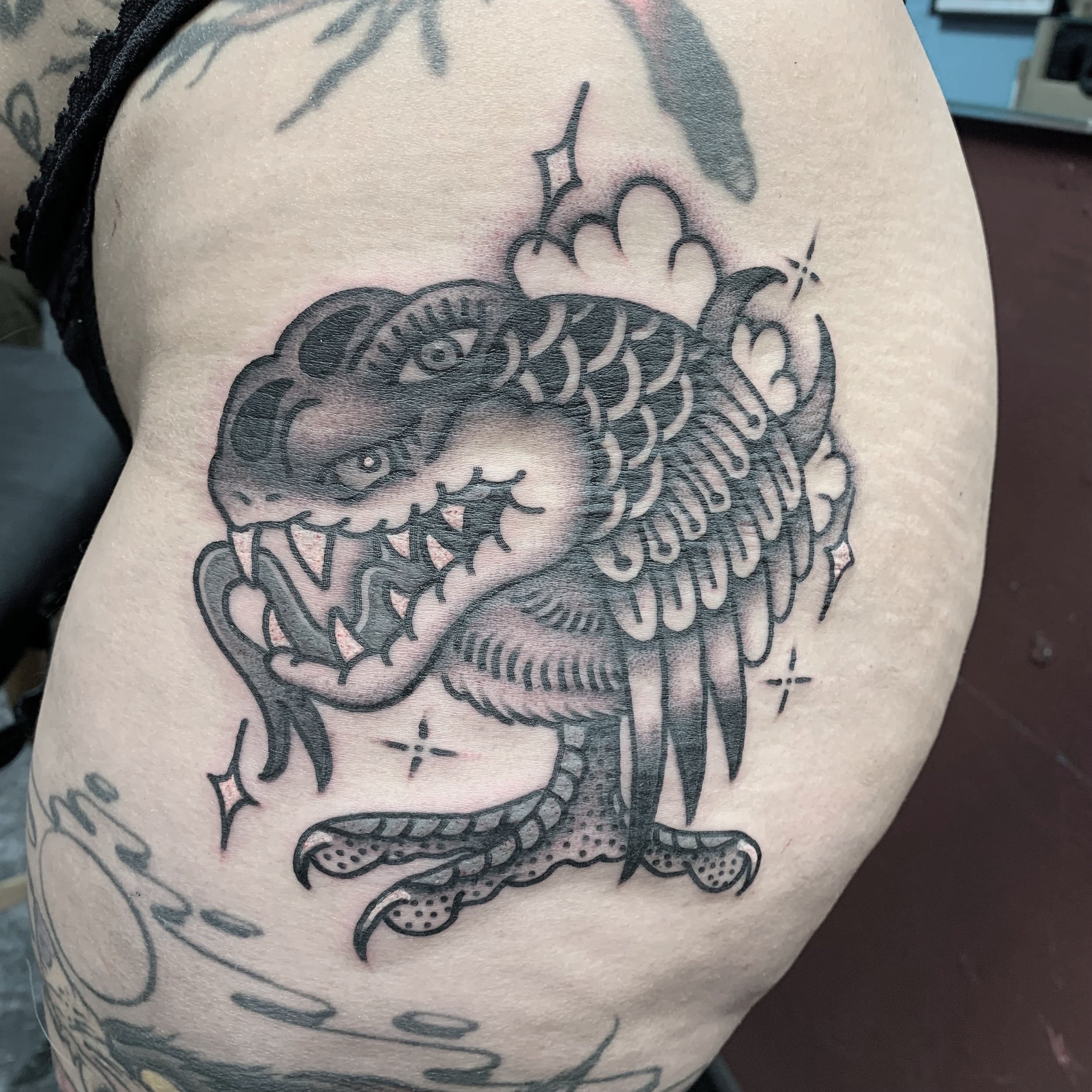 Traditional Blackwork Tattoo of a freaky winged snake creaure