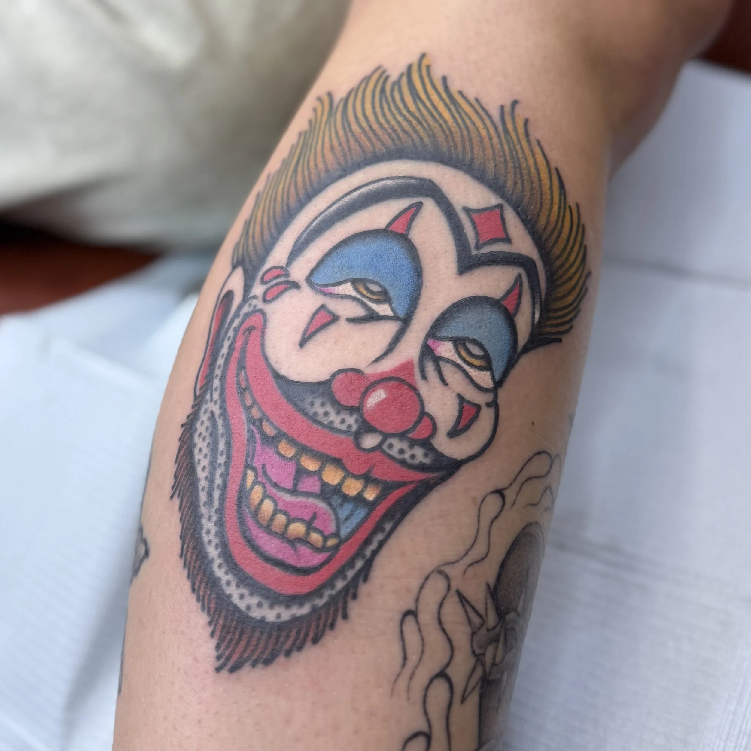 traditional clown face tattoo