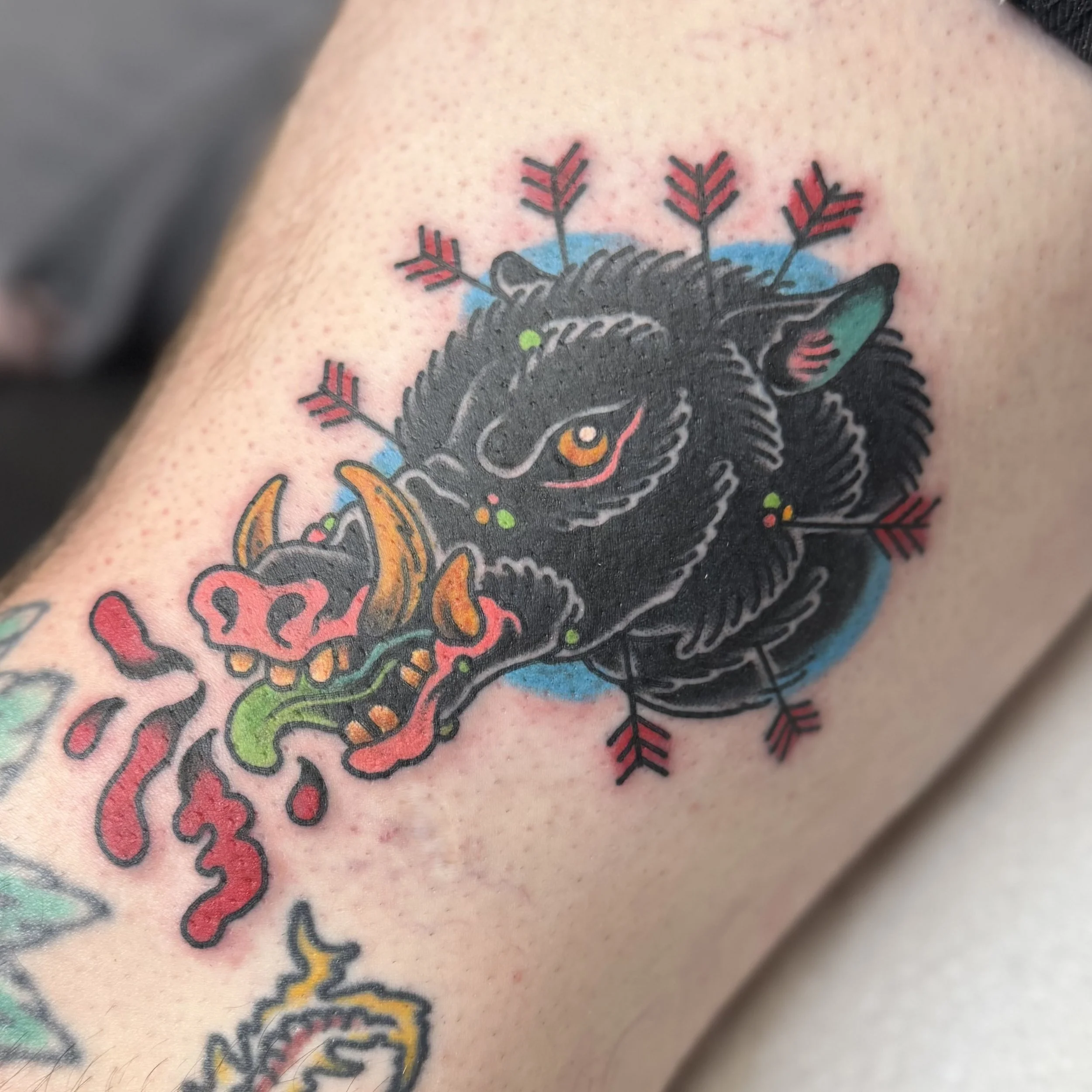 tradtional boar head tattoo with arrows