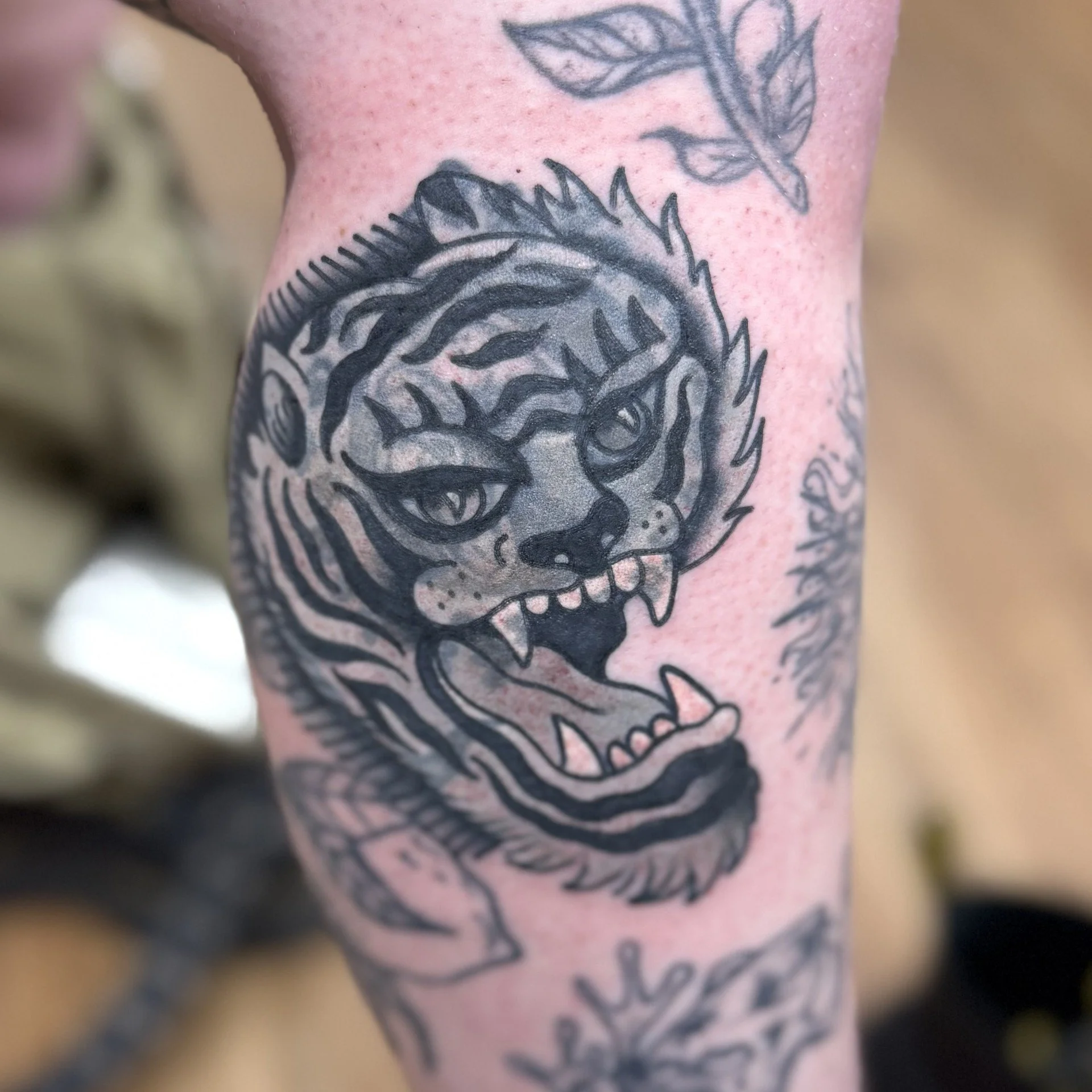 Blackwork Blastover Tattoo of a Derpy Tiger head