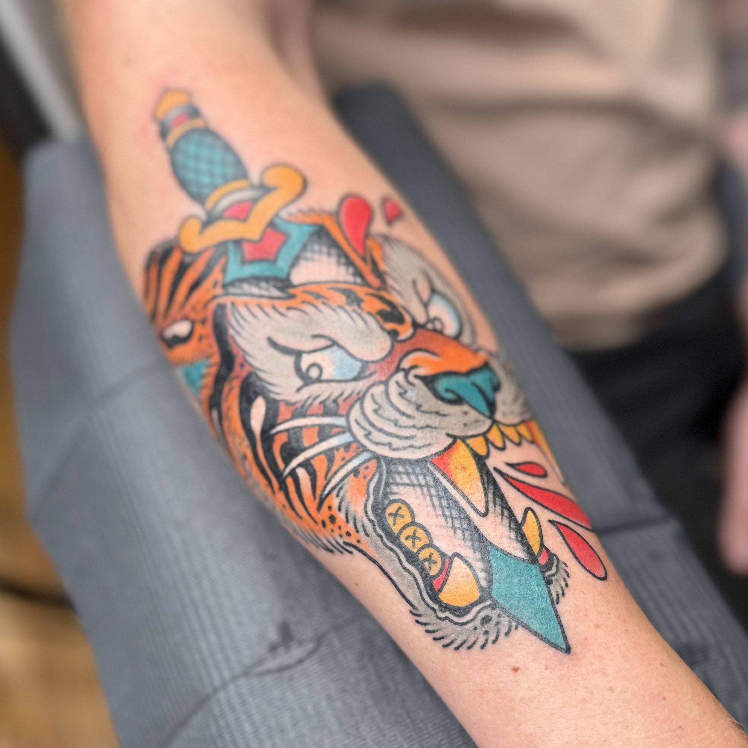American traditional Tiger head with dagger