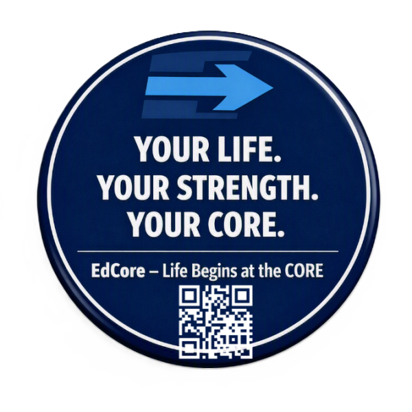 A circular blue sign with a white arrow pointing right, containing the text: "YOUR LIFE. YOUR STRENGTH. YOUR CORE." and an additional line "EdCore – Life Begins at the CORE" with a QR code below.