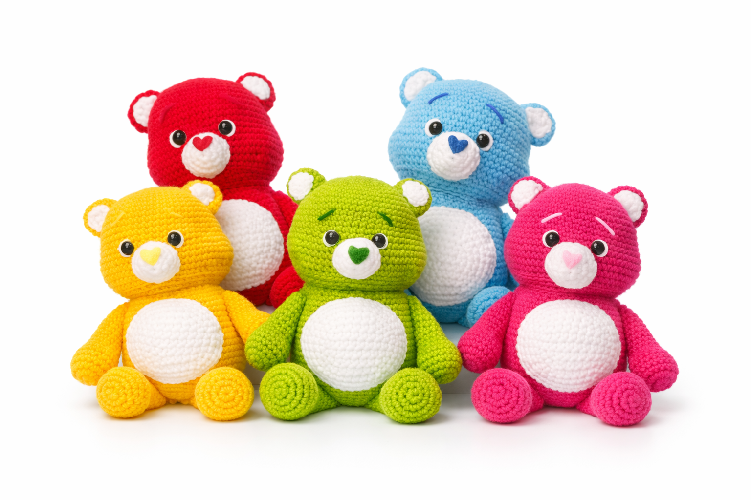 Six colorful crocheted teddy bears in red, blue, yellow, green, pink, and orange, sitting and arranged on a white background.