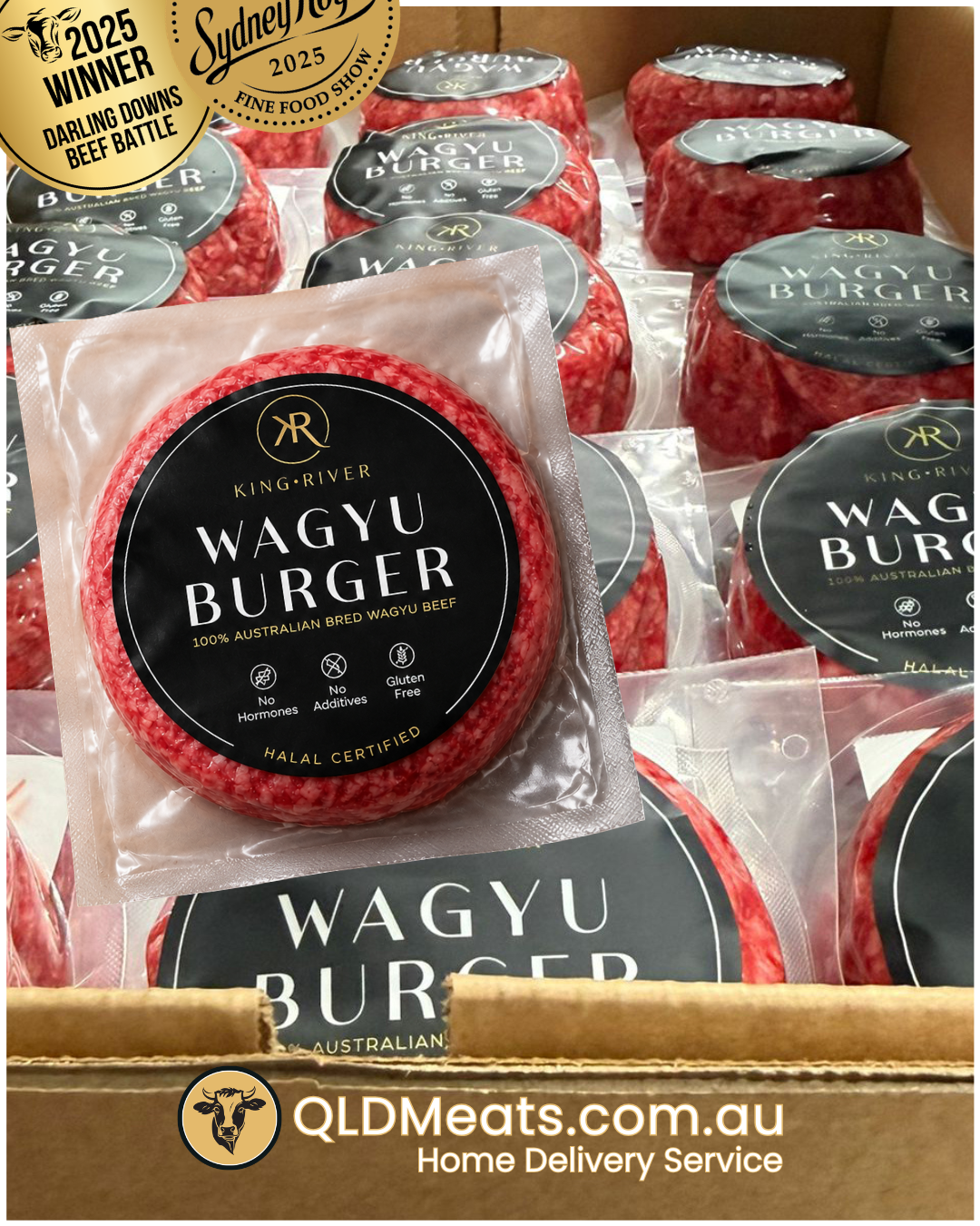 Vacuum-sealed beef burger patties labeled as 'WAGYU BURGER' from King River, certified halal, gluten free, no hormones, and no additives, displayed in a cardboard box with a website URL for Queensland meats.