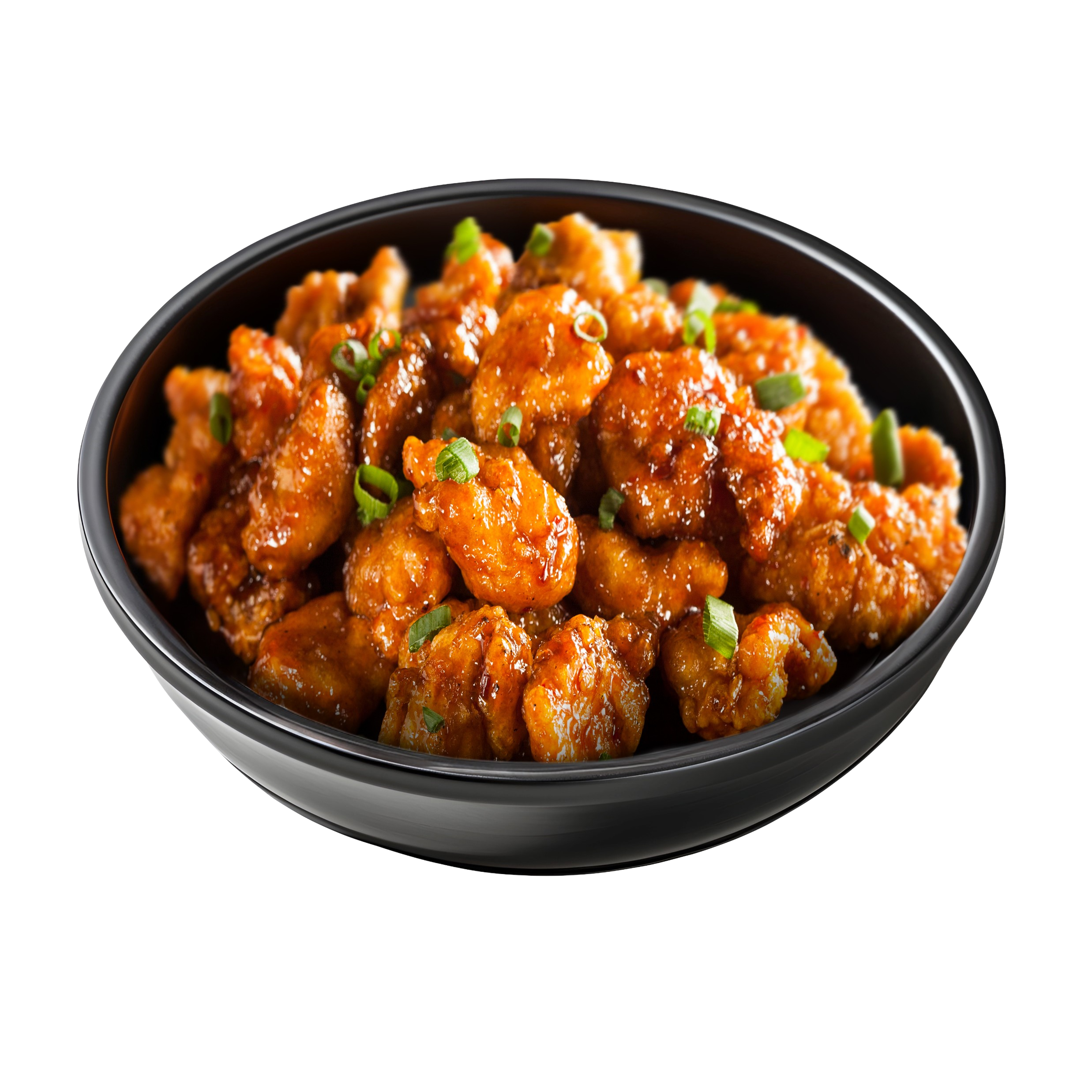 Close-up of a black bowl filled with orange chicken coated in sauce, garnished with chopped green onions.