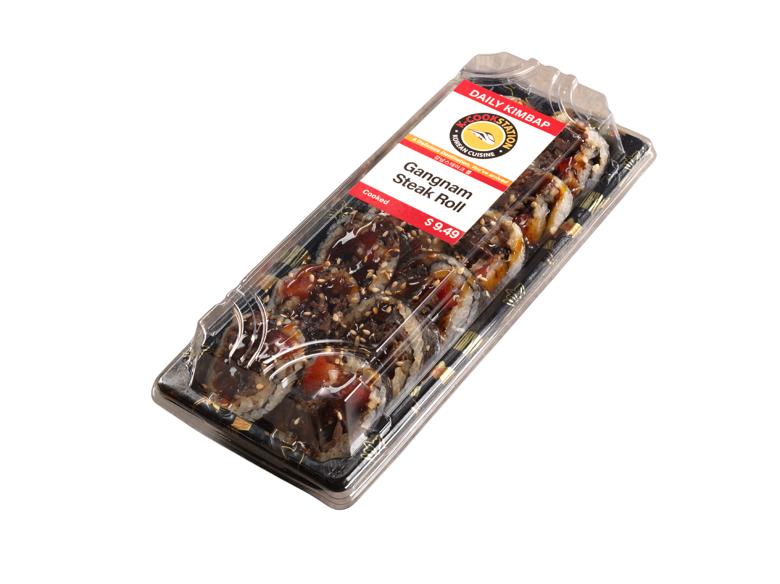 Pre-packaged K-town Korean cuisine Gangnam Steak Roll in a rectangular plastic container with a clear lid, garnished with sesame seeds.