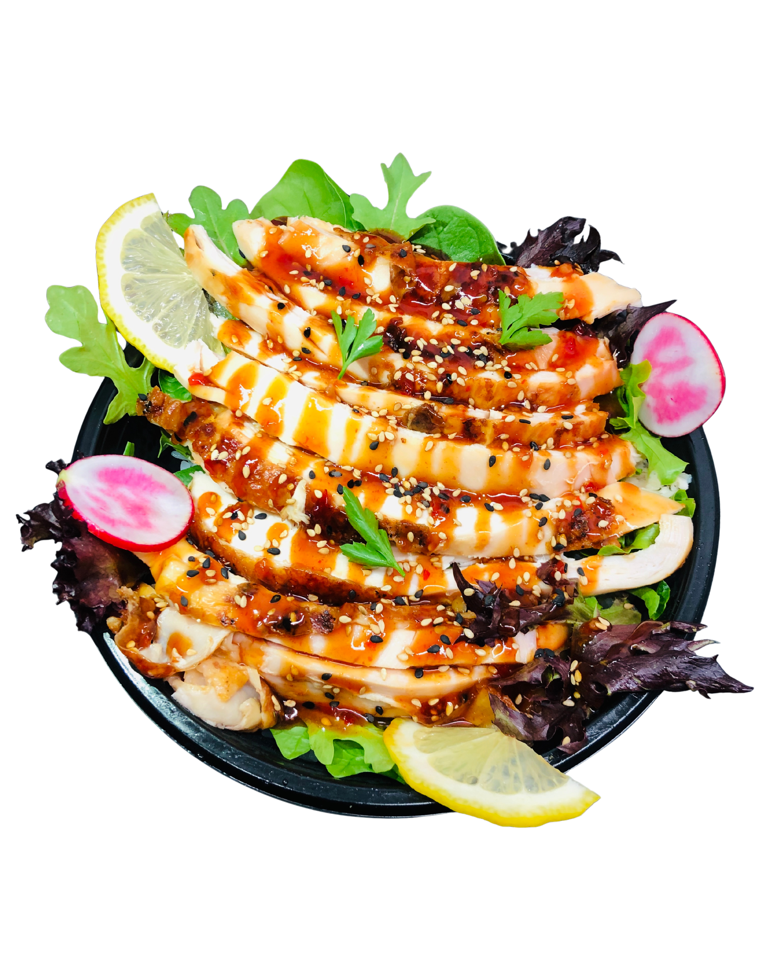 Plate of grilled chicken salad with lemon slices, mixed greens, radish slices, and sesame seed topping.