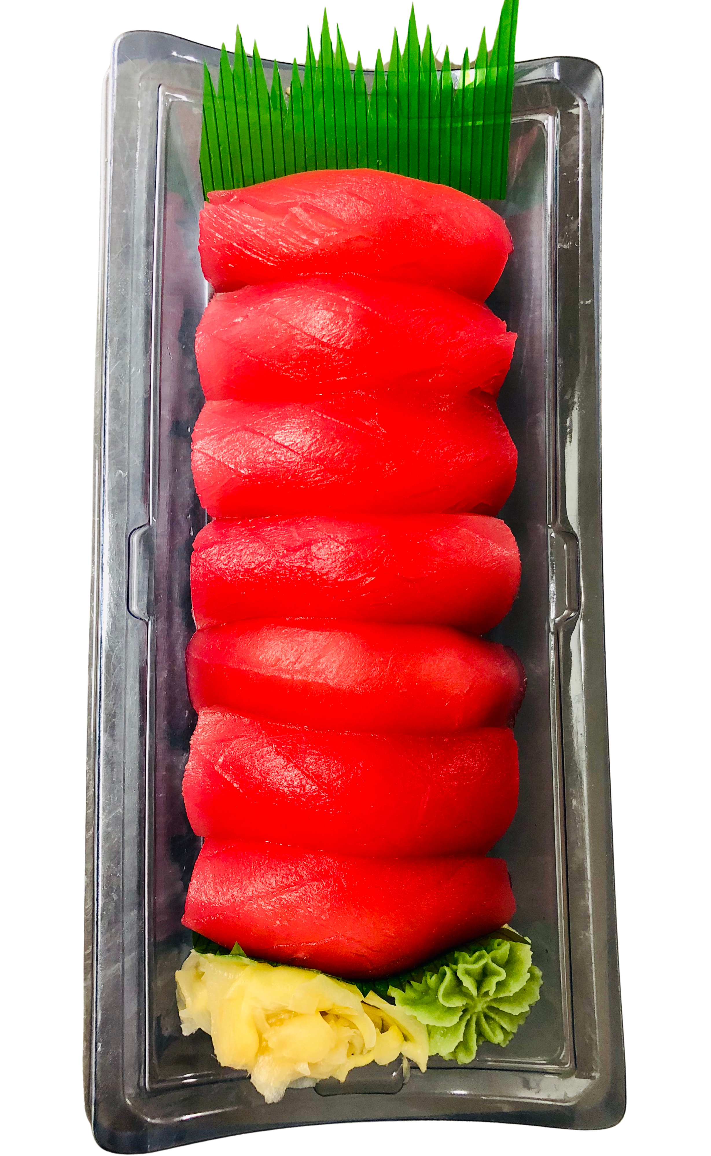 Sliced red tuna sashimi arranged in a row in a metal tray, garnished with green plastic grass, pineapple, and lettuce near the bottom.