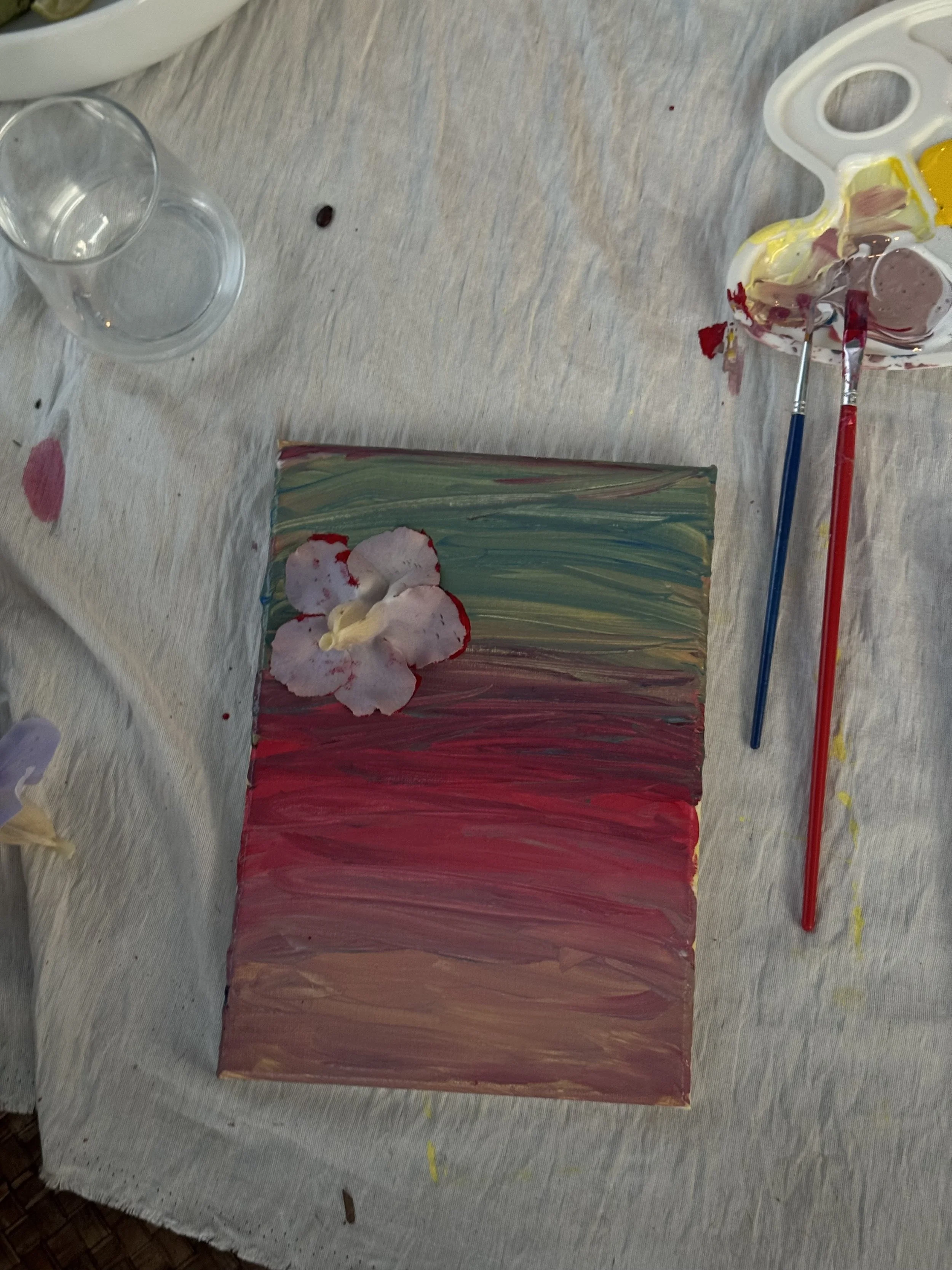 Evening art workshop and shared creative time at the villa.