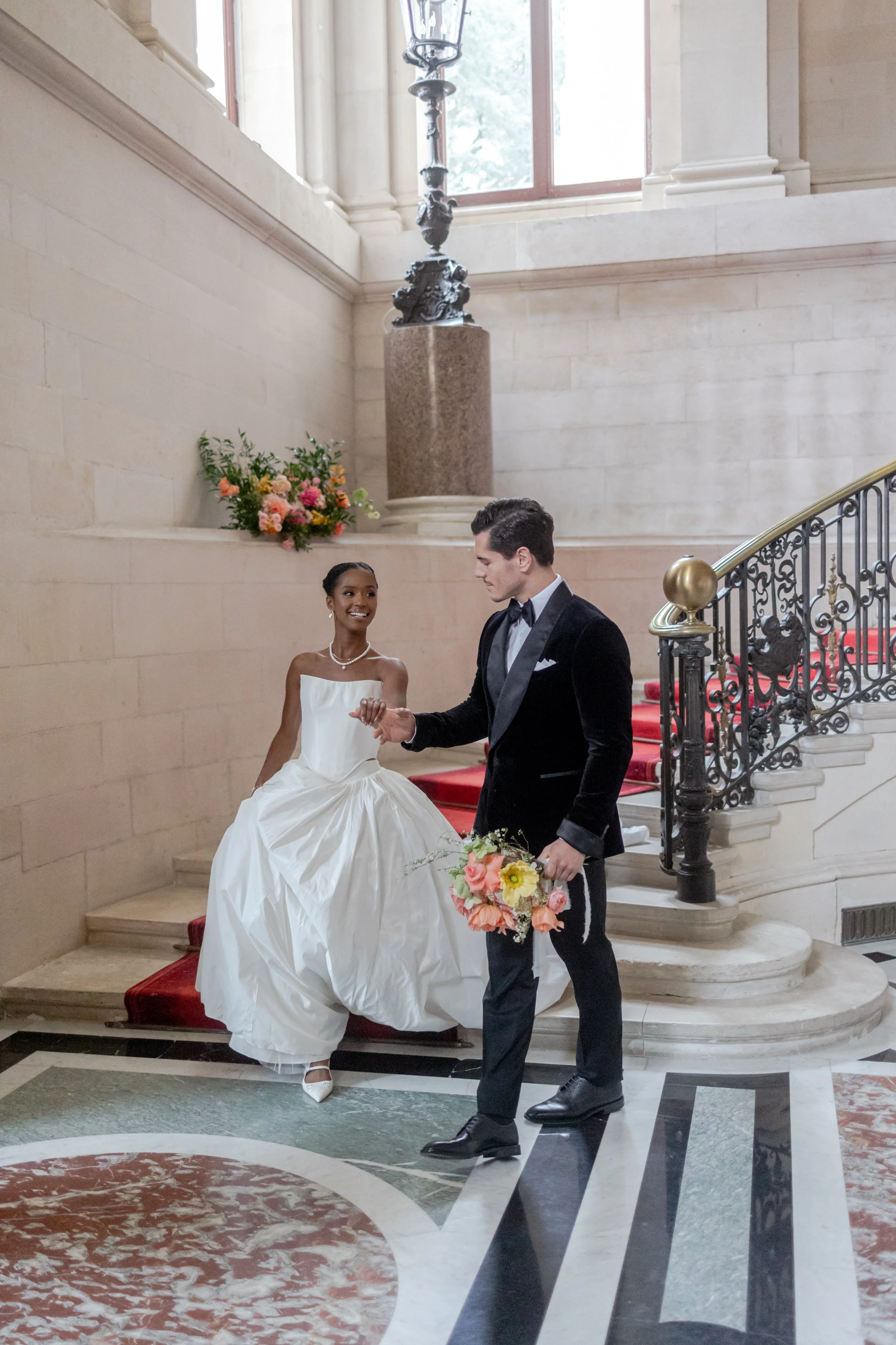 Luxury wedding at Château de Ferrières near Paris, France. Elegant bride and groom captured in a timeless French château setting with refined details, romantic architecture, and editorial wedding photography.