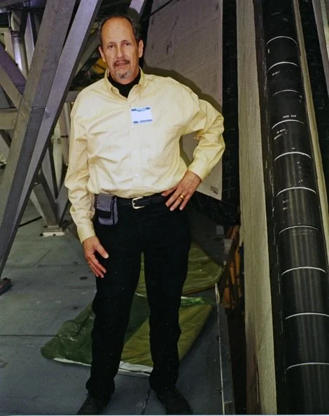 Richard Clar standing next to the tail of U.S Space Shuttle Endeavor
Boeing facilities, Palmdale, California
1998