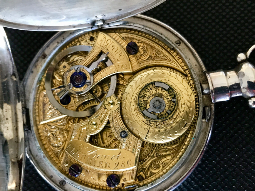 3. Bovet Fleurier pocket watch with interior cover open showing engraved movement – photo: Richard Clar