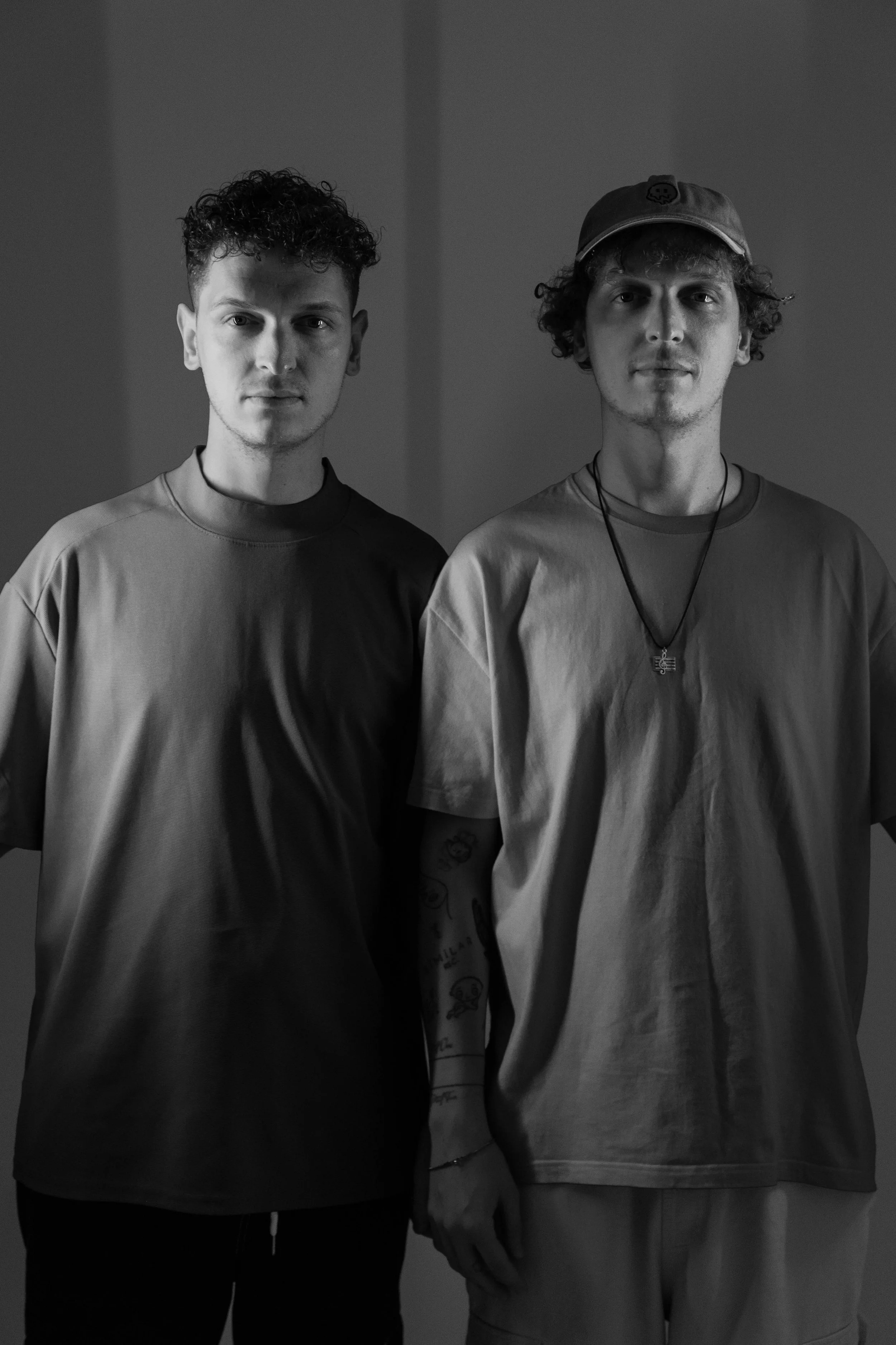 Merter and Mertchan Tzivan Sali, both Members of "LAMPETEE" photo looking to the camera, close up to their face.