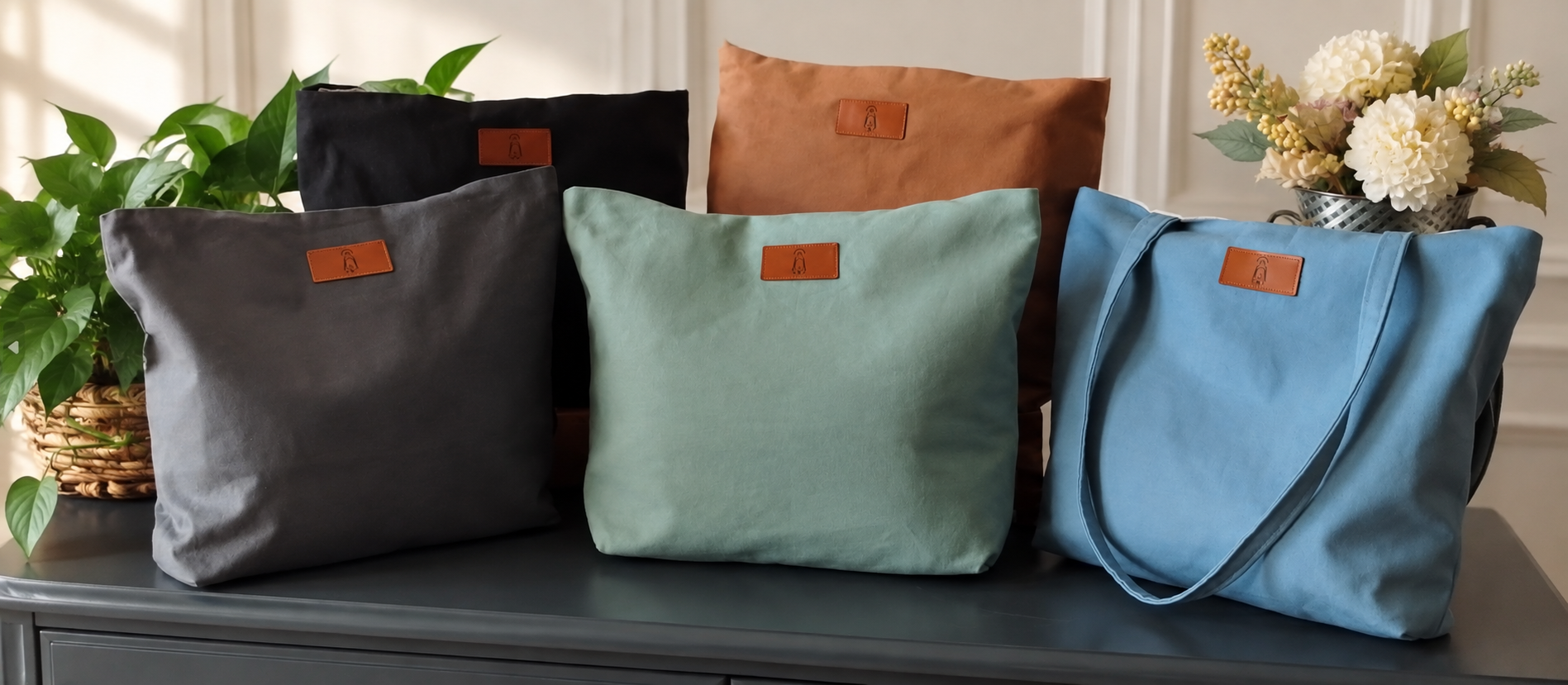 Handmade duck canvas tote bags in black, dark gray, sage, dusty blue and nutmeg