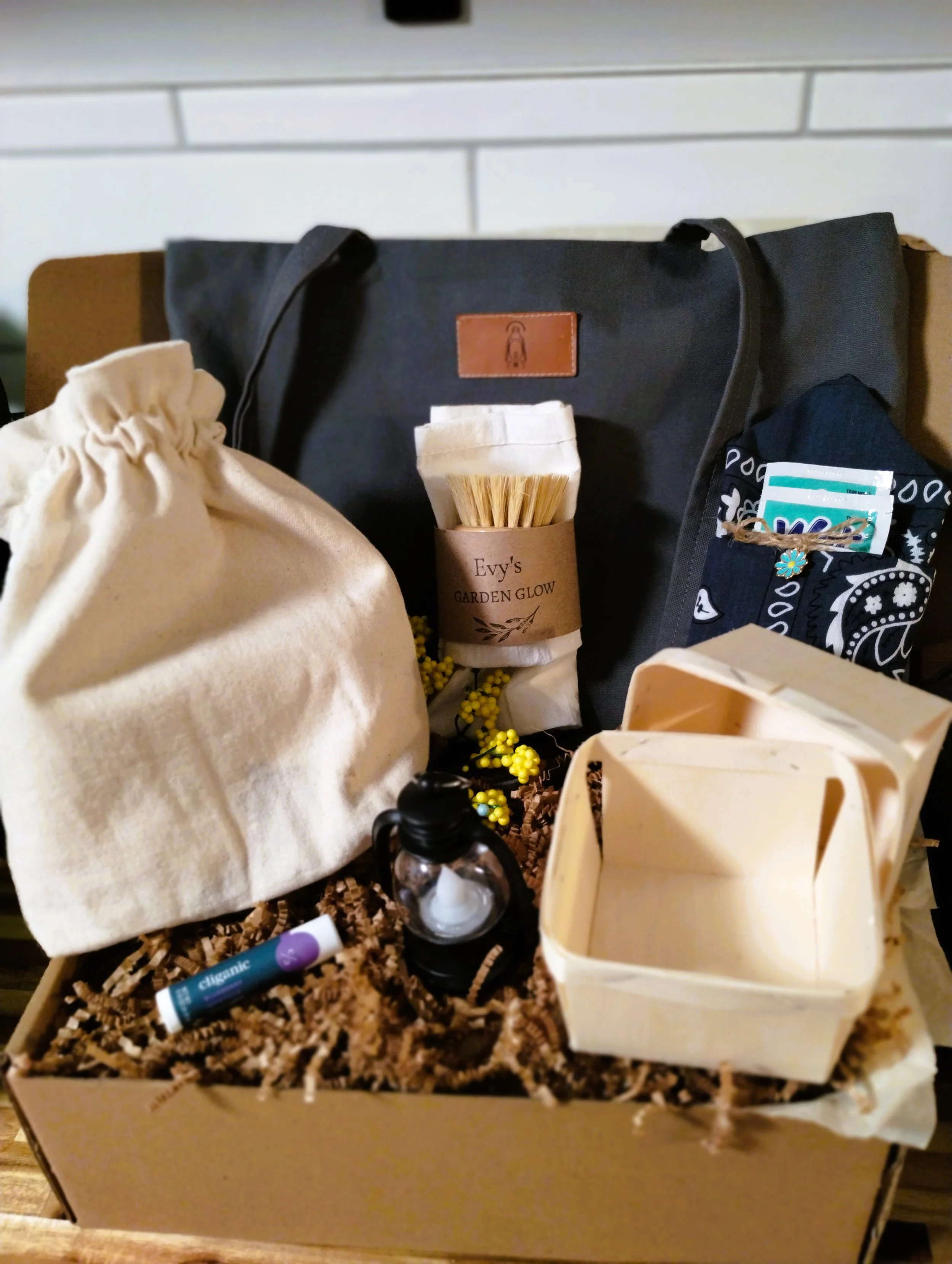 Market Collection gift box with handmade charcoal tote, canvas gathering pouch, wooden berry baskets, produce cloth, scrubber, personal bundle and mini lantern.