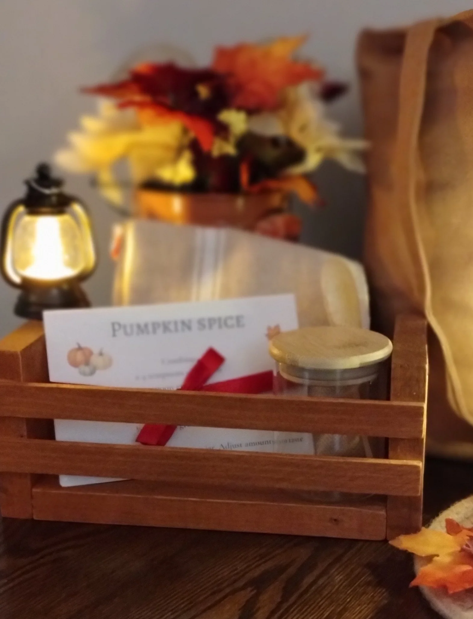 Autumn Afternoon gift collection with handmade nutmeg canvas tote, wooden crate, recipe cards, kitchen accessories and glowing lanterns.