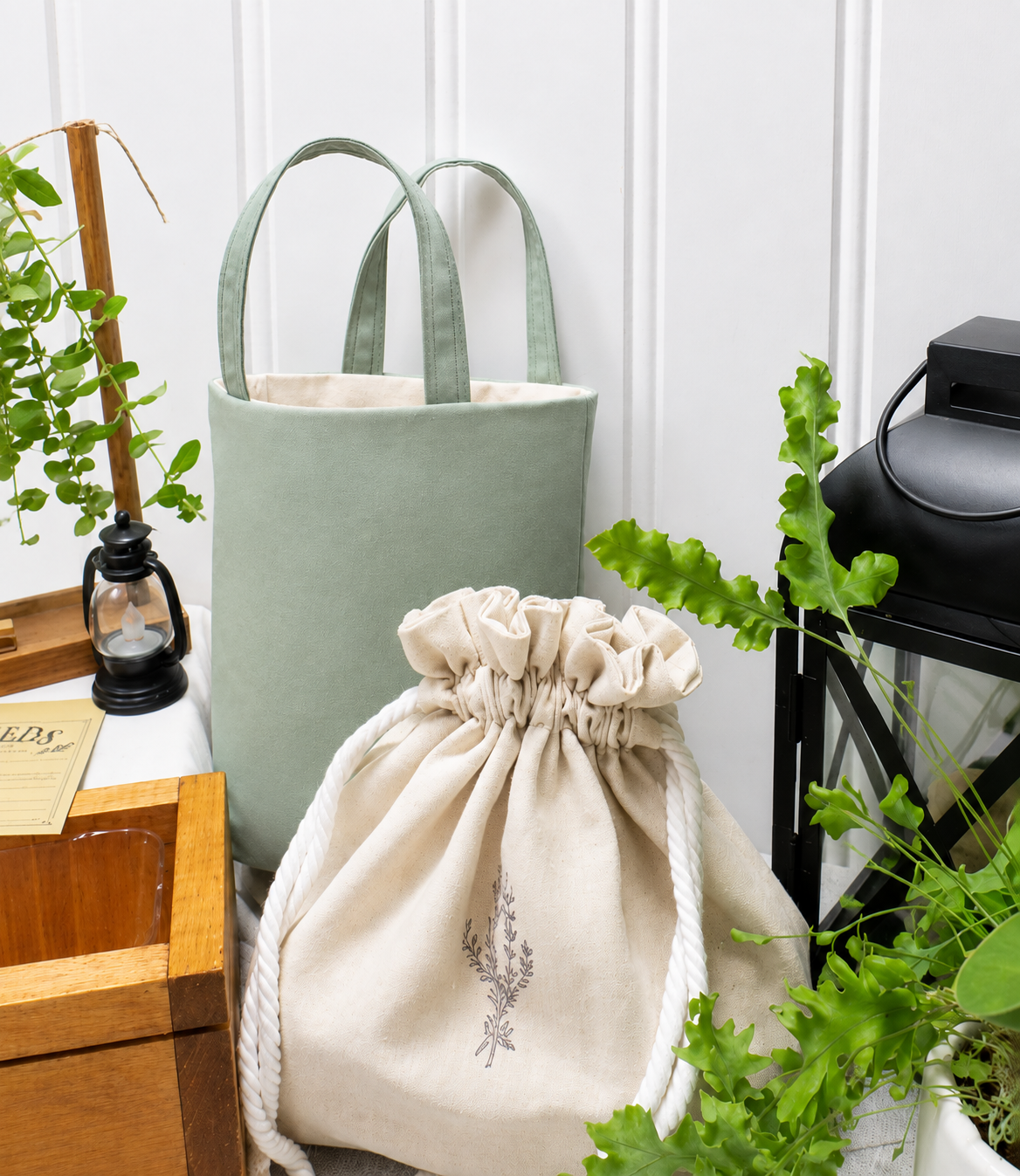 Herb Garden collection sage green tote bag and natural canvas color gathering pouch with mini lantern and greenery