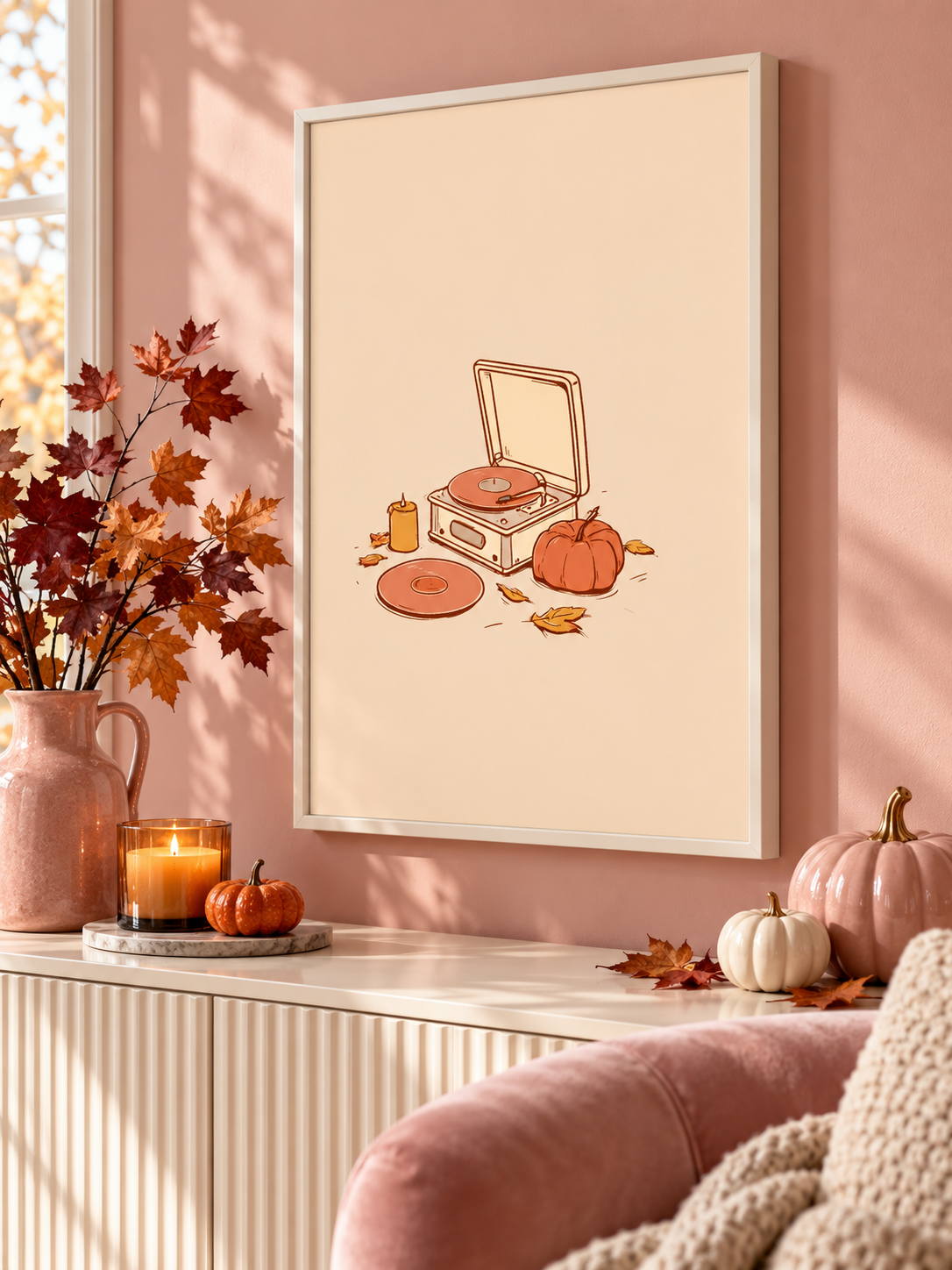 Framed autumn record-player print in blush room.png