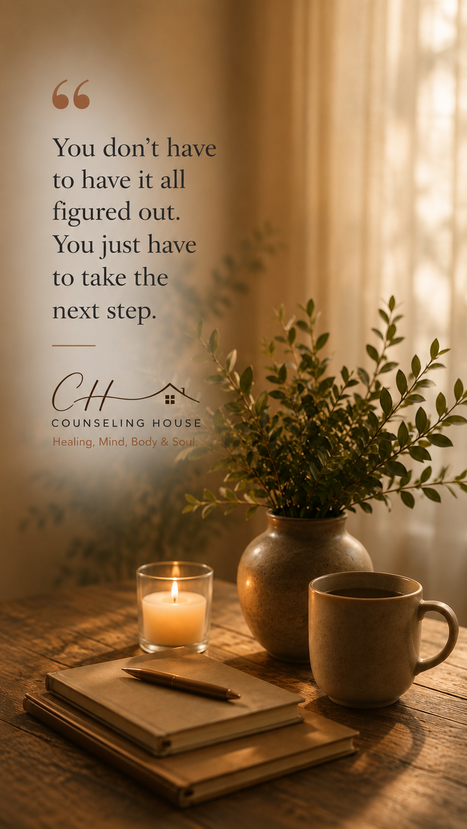 A cozy scene with a lit candle, a cup of coffee, a stack of notebooks with a pen on top, a large vase with greenery, and a motivational quote on the wall about taking the next step.