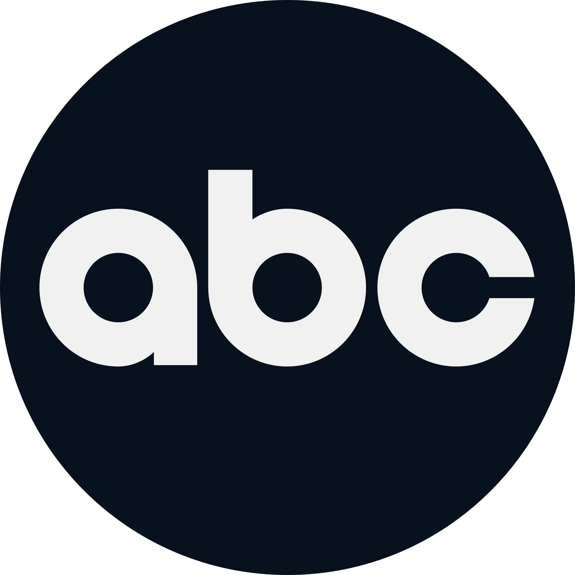 Close-up of a logo featuring white, lowercase letters 'abc' on a black circular background.