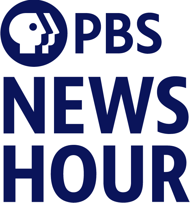 The PBS NewsHour logo featuring a white graphic of a human face profile with a grid pattern and the words 'PBS NEWS HOUR' in dark blue.