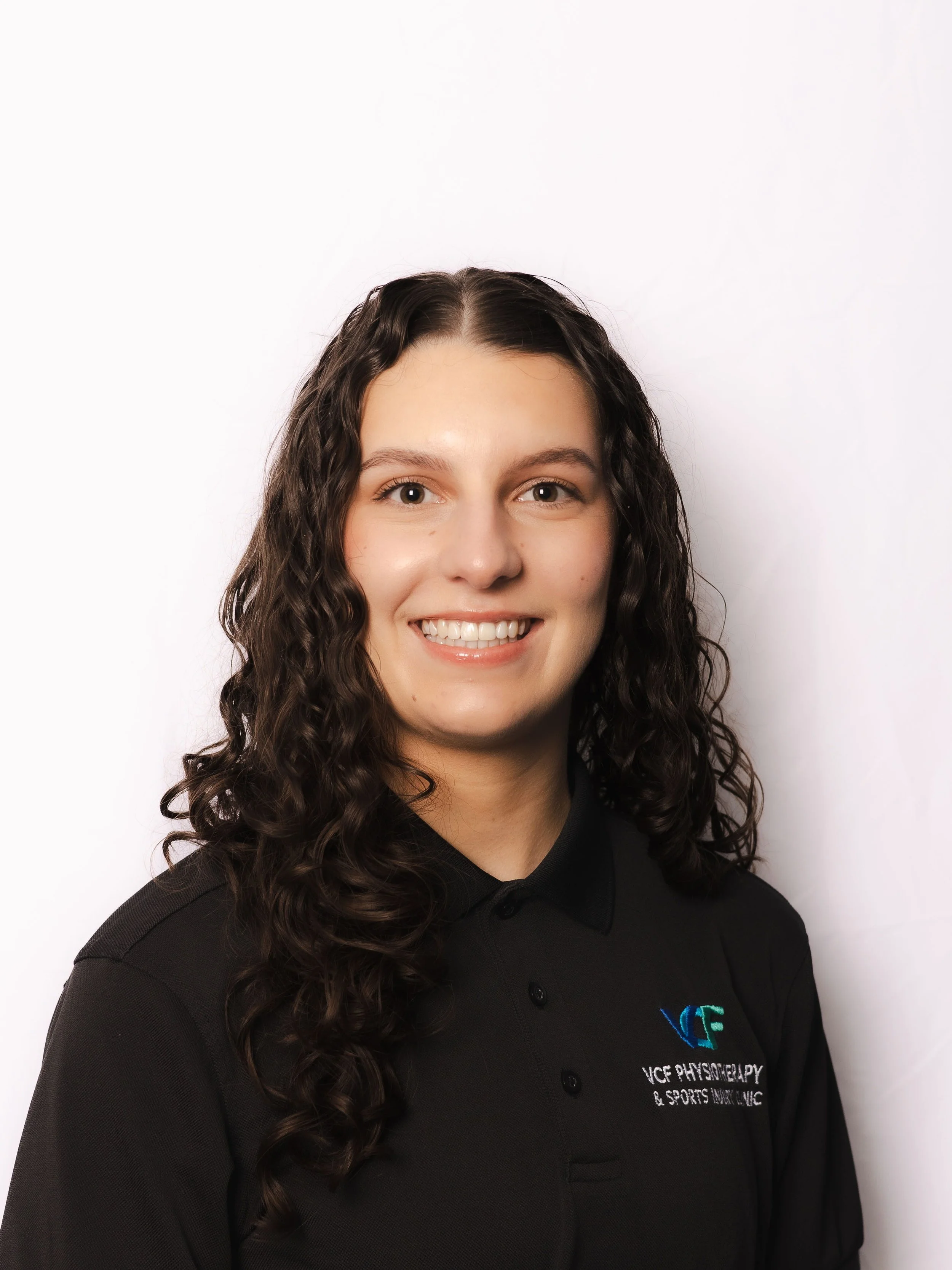 Portrait of Mia Bradford, chartered physiotherapist