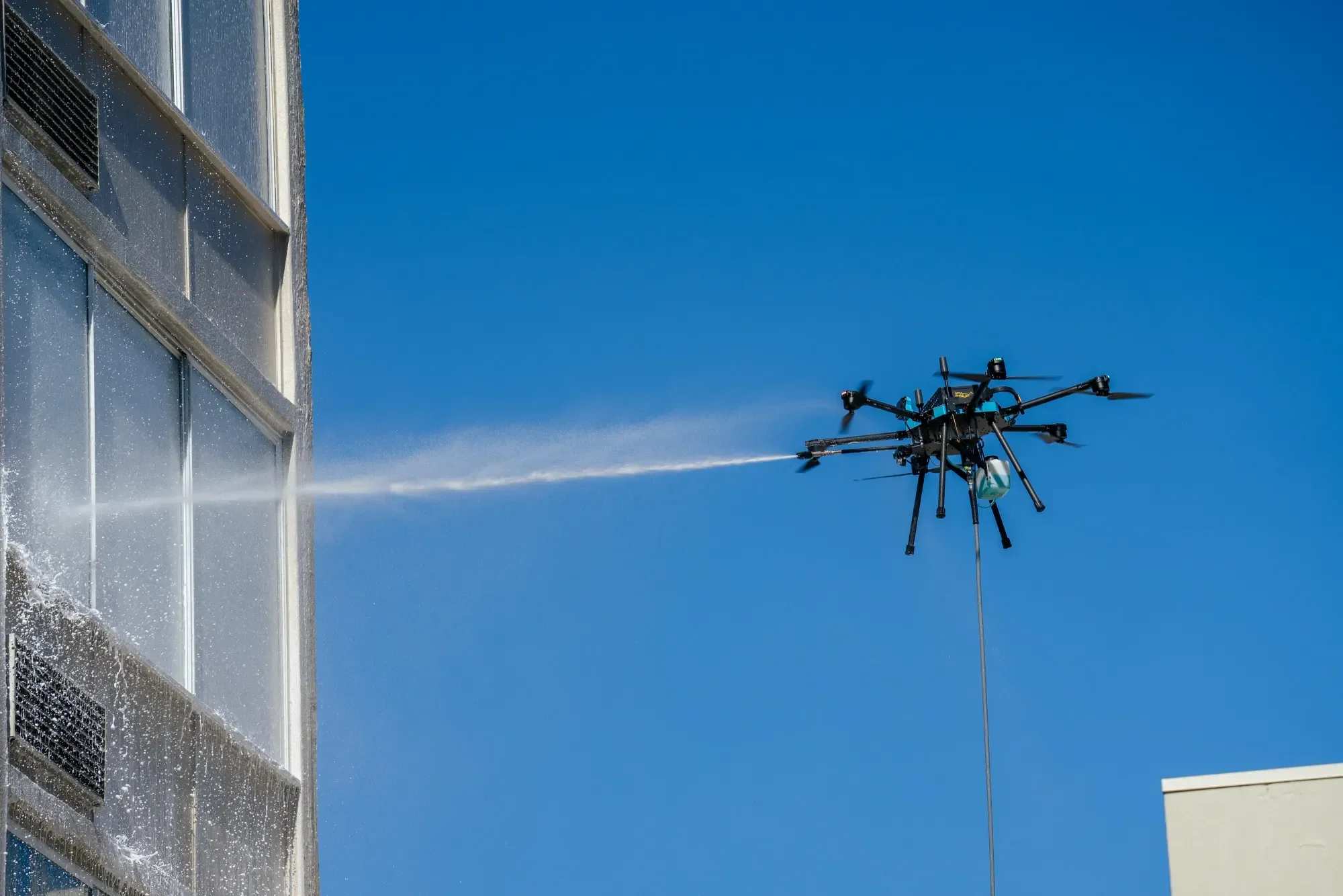 Drone washing window soap