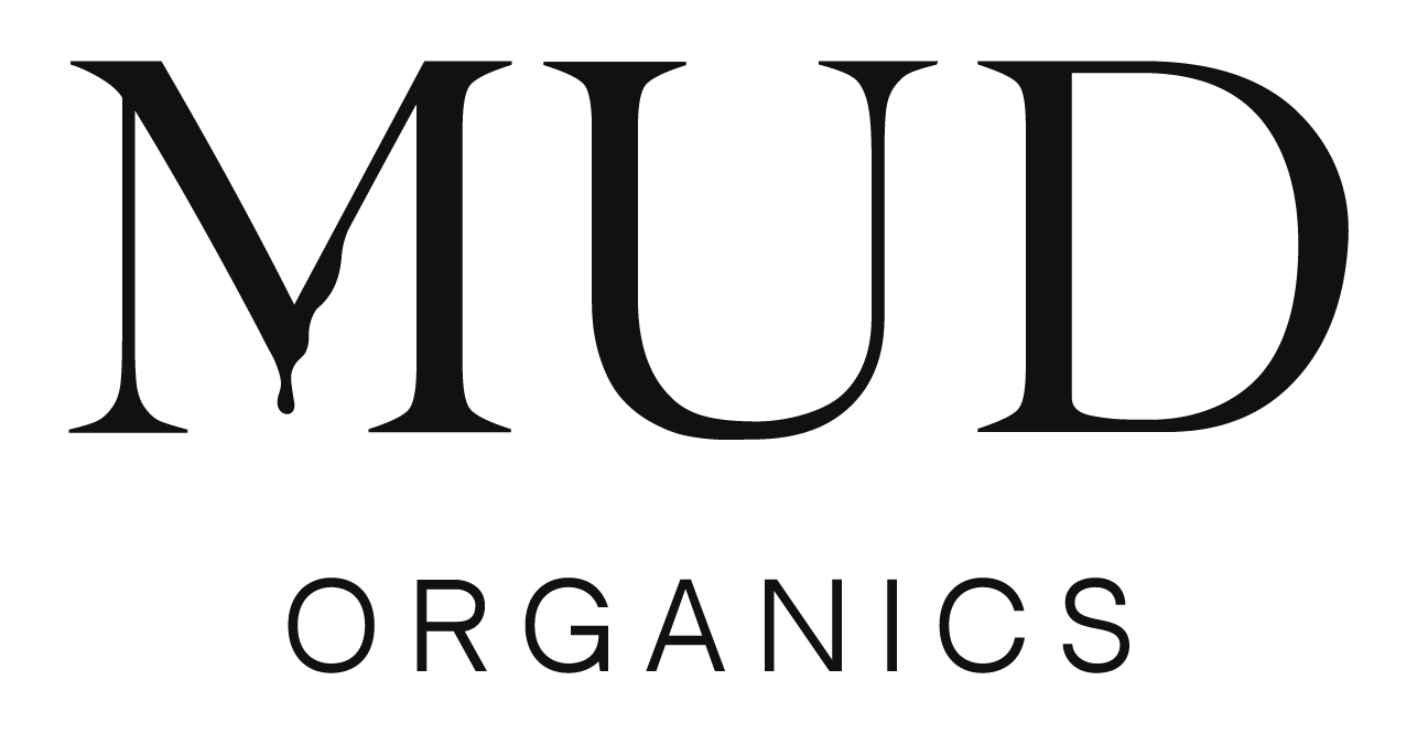Black text reading 'MUD ORGANICS' on a white background.