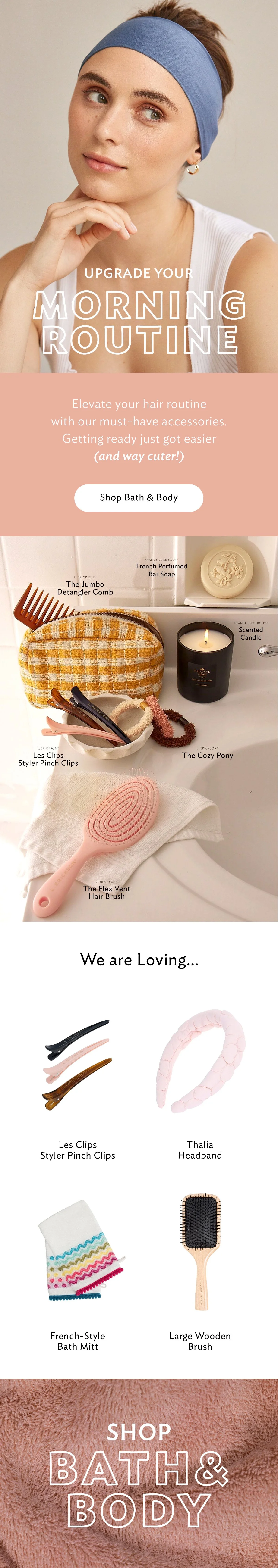 A woman with fair skin and brown hair pulled back, wearing a blue headband, is smiling slightly and resting her chin on her hand. The image promotes upgrading your morning routine with beauty and bath products.