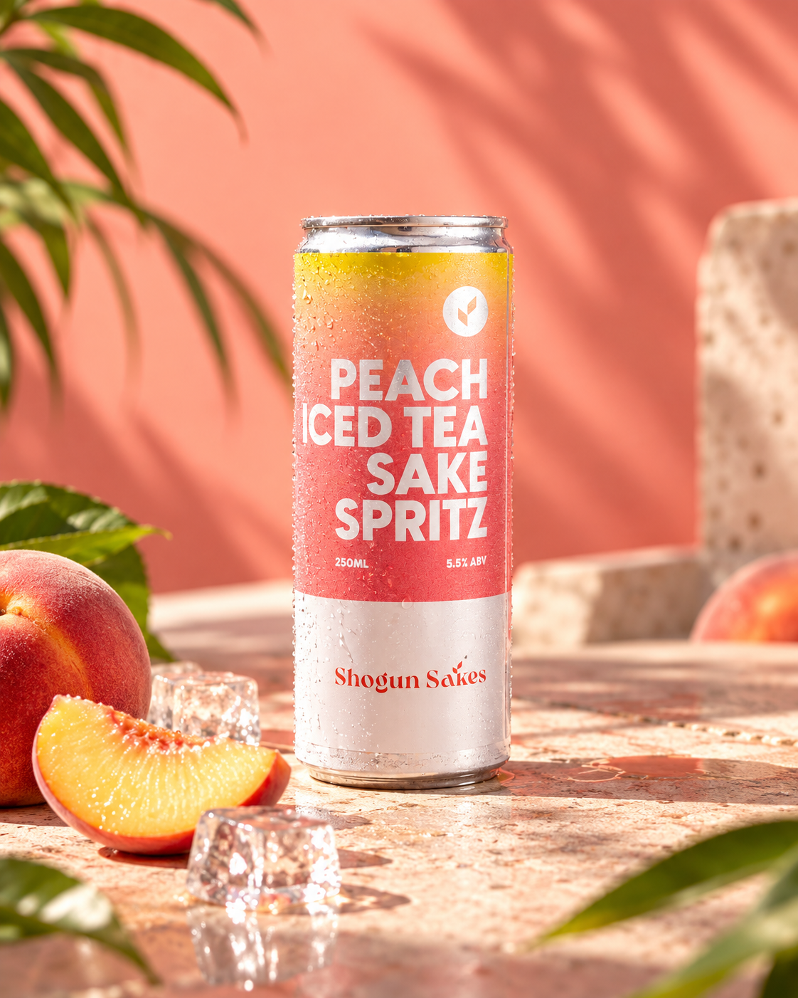 Can of Peach Iced Tea Sake Spritz with condensation on the can, placed on a stone surface with peaches, leaves, and ice cubes around it, and a pink background.