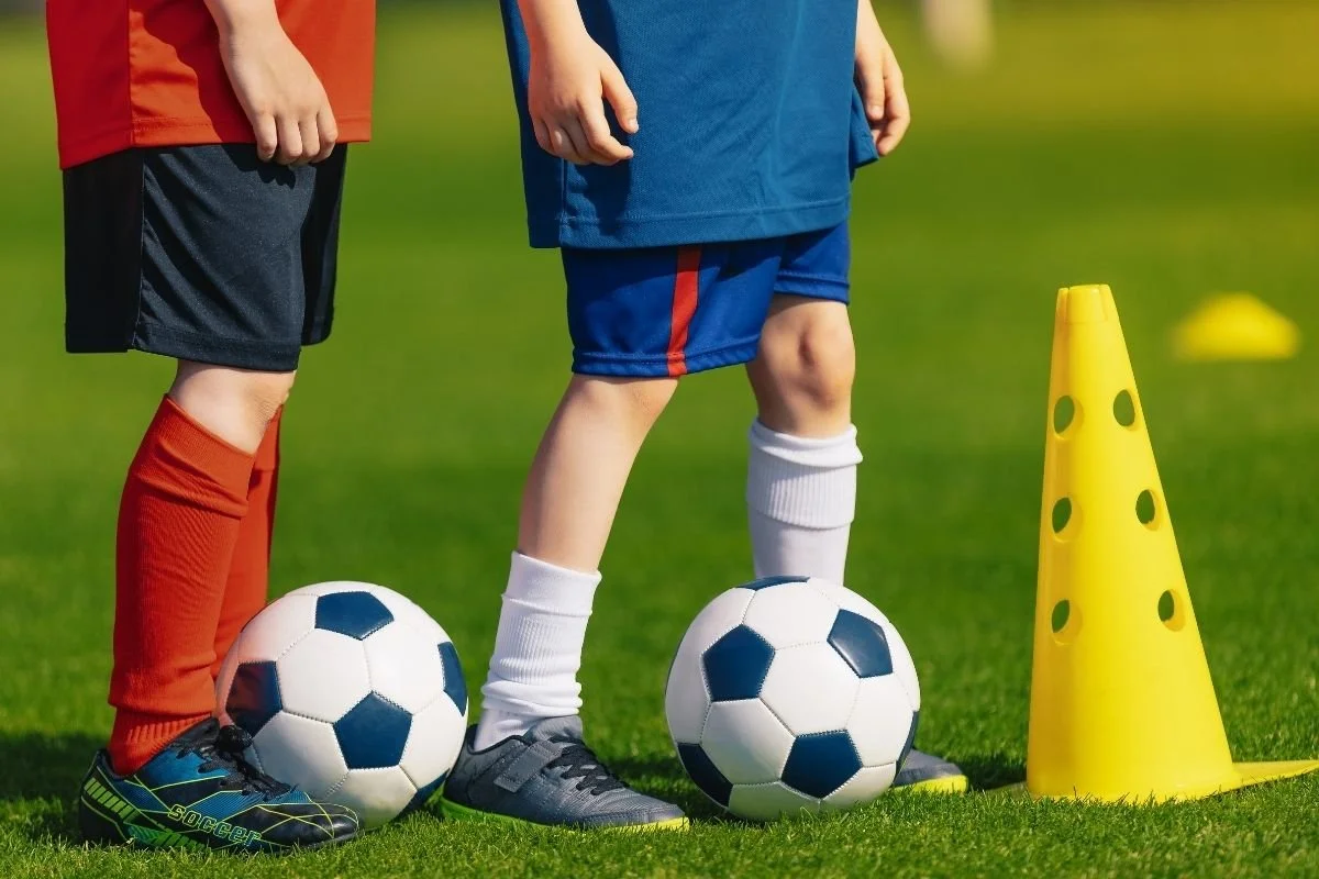 Children playing soccer.