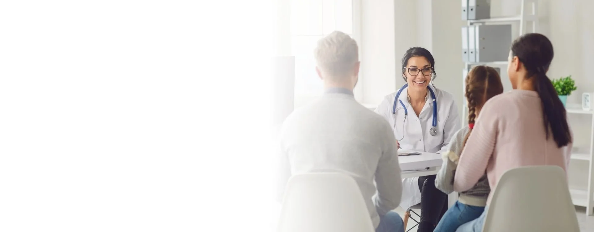 Primary care doctor at IndyCare speaking with patients