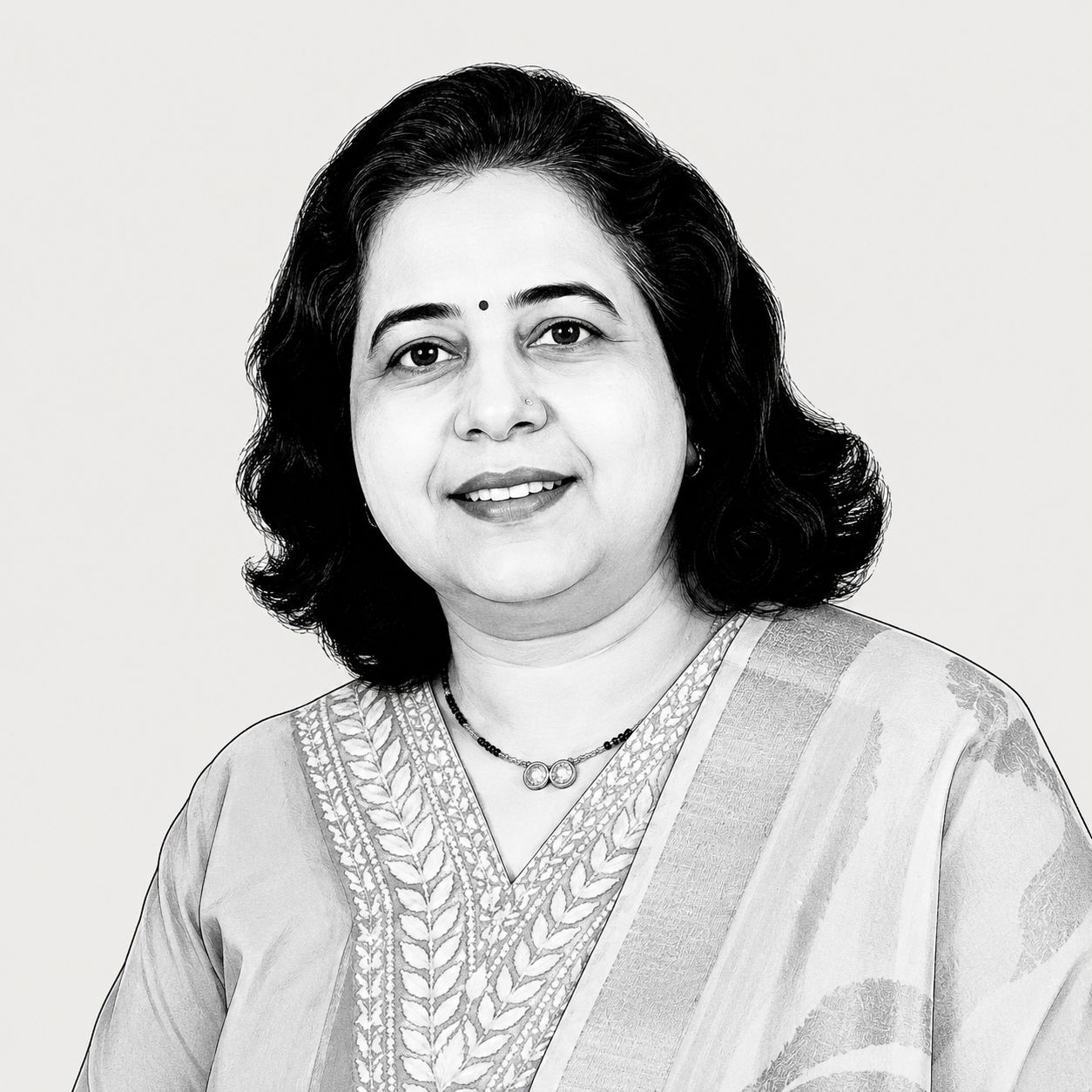 Black and white portrait of a woman with wavy hair, wearing traditional Indian attire, a necklace, and earrings.